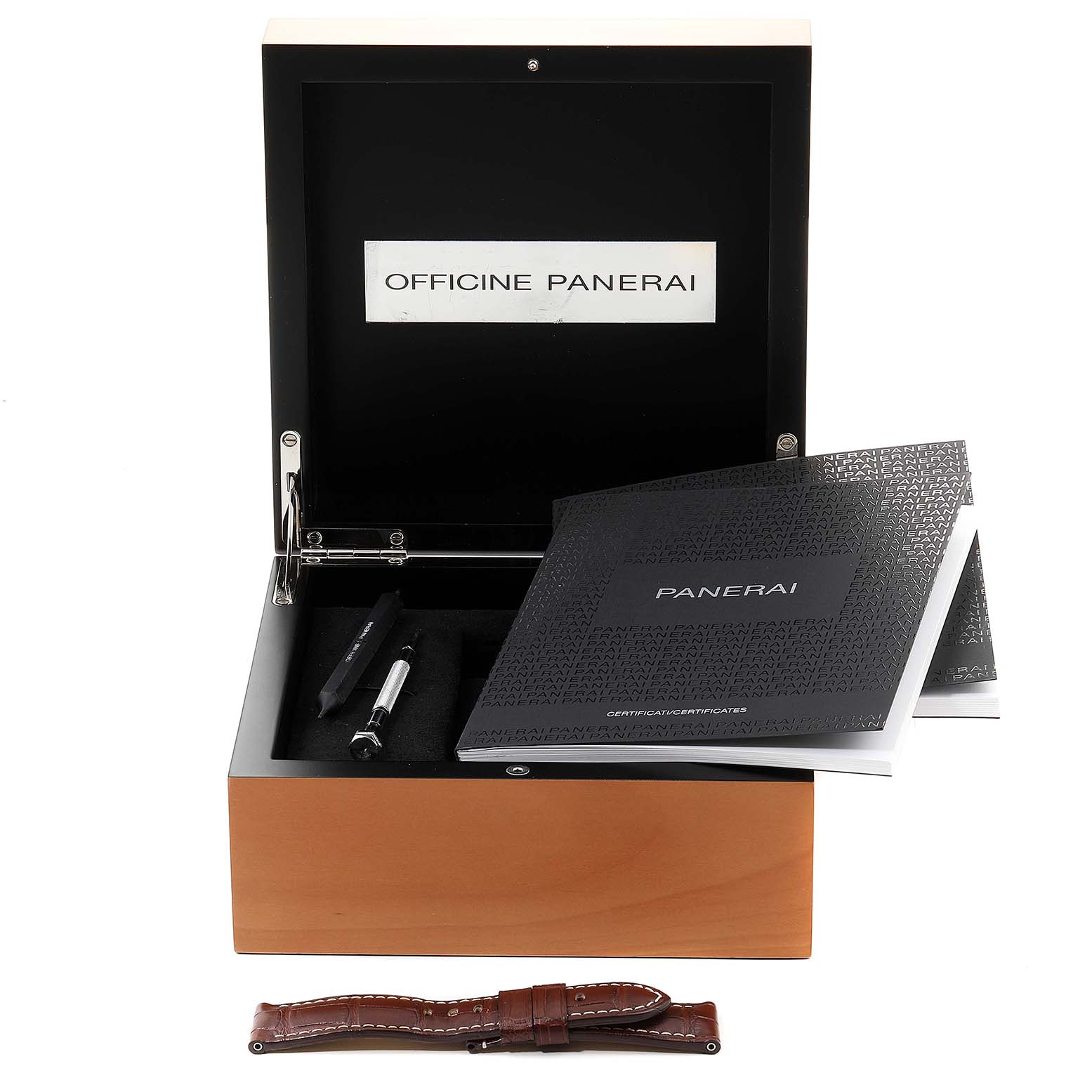 This image shows the open box, manuals, tools, and an additional strap for the Panerai Luminor PAM00320 Men's Stainless Steel Black Dial PAM00320 Men's Stainless Steel Black Dial watch from a frontal angle.