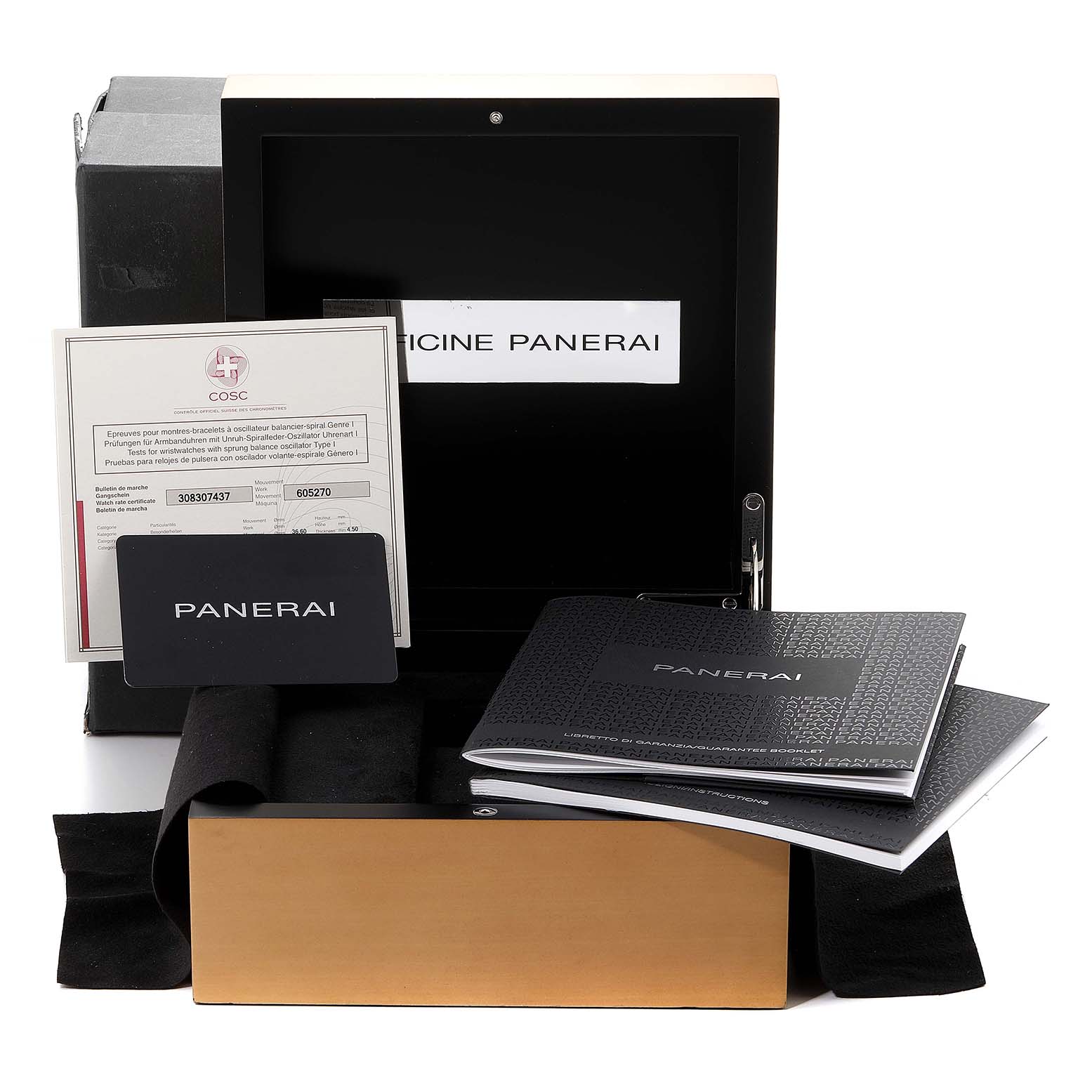 This image shows the packaging and documentation for a Panerai Luminor PAM01005 Men's Stainless Steel Black Dial PAM01005 Men's Stainless Steel Black Dial watch, including the box, manuals, and certificates.