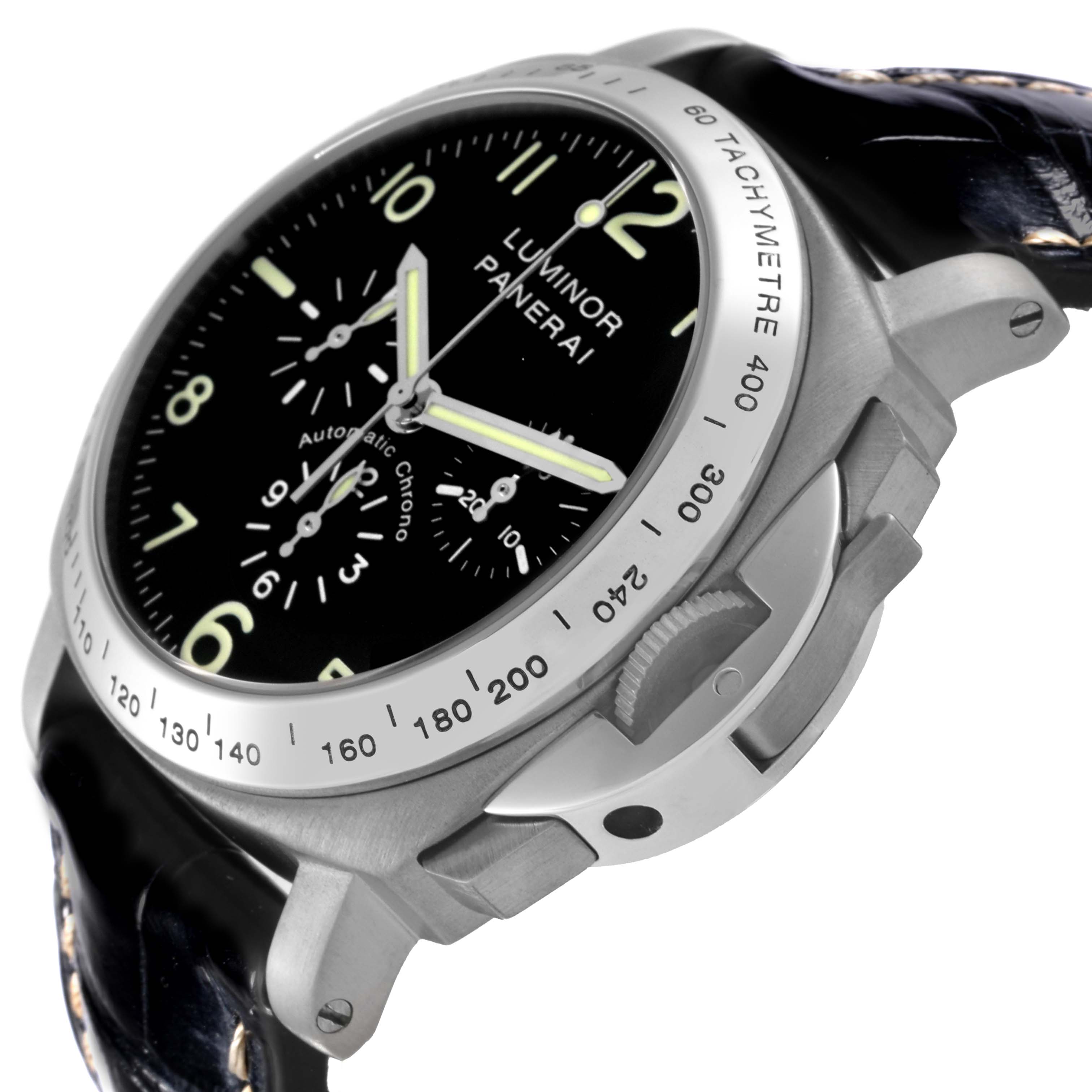 The Panerai Luminor PAM00074 Men's Titanium Black Dial PAM00074 Men's Titanium Black Dial watch is shown at an angle highlighting the bezel, tachymeter scale, dial, and crown guard.