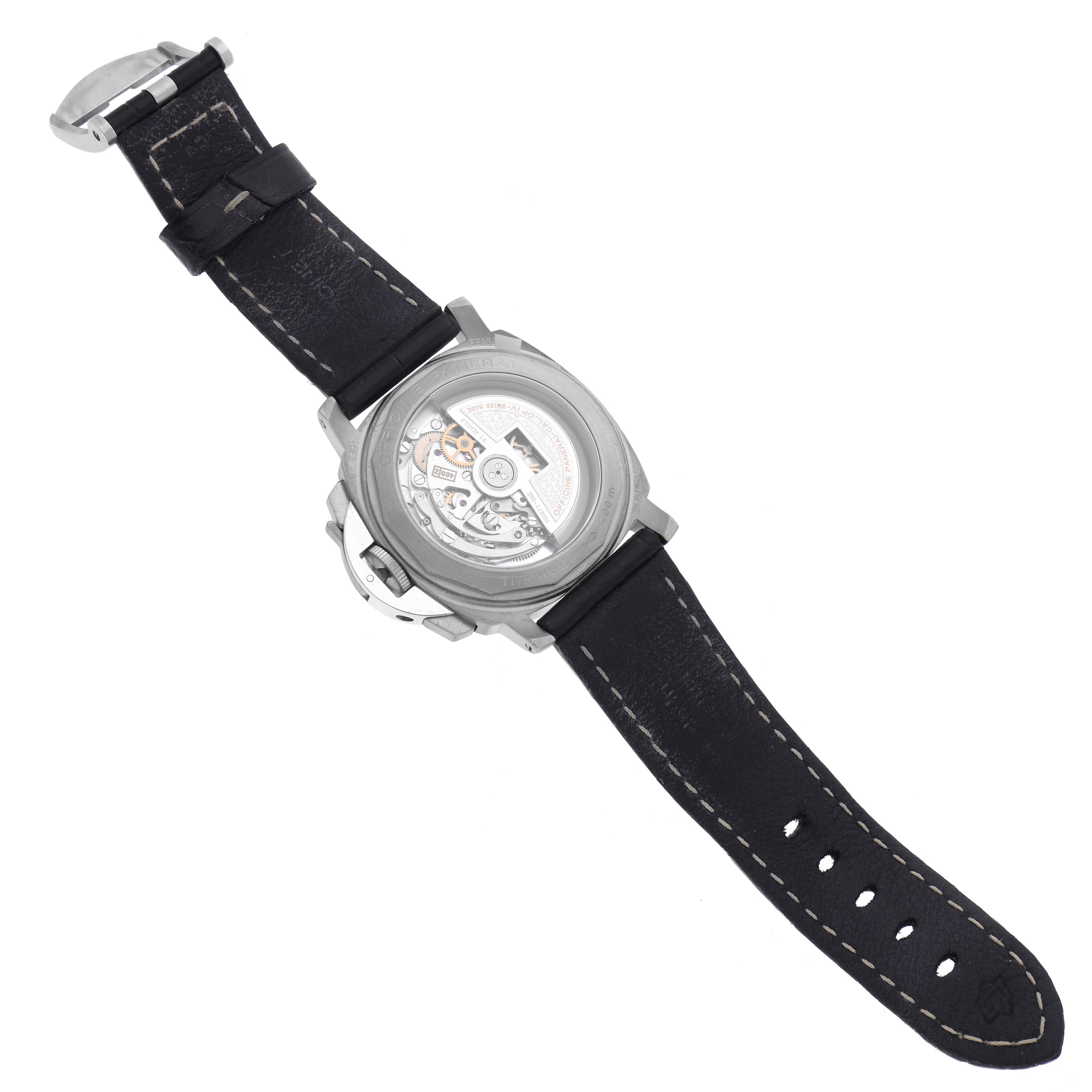 The image shows the Panerai Luminor PAM00074 Men's Titanium Black Dial PAM00074 Men's Titanium Black Dial watch from the back, displaying the transparent case back and leather strap.