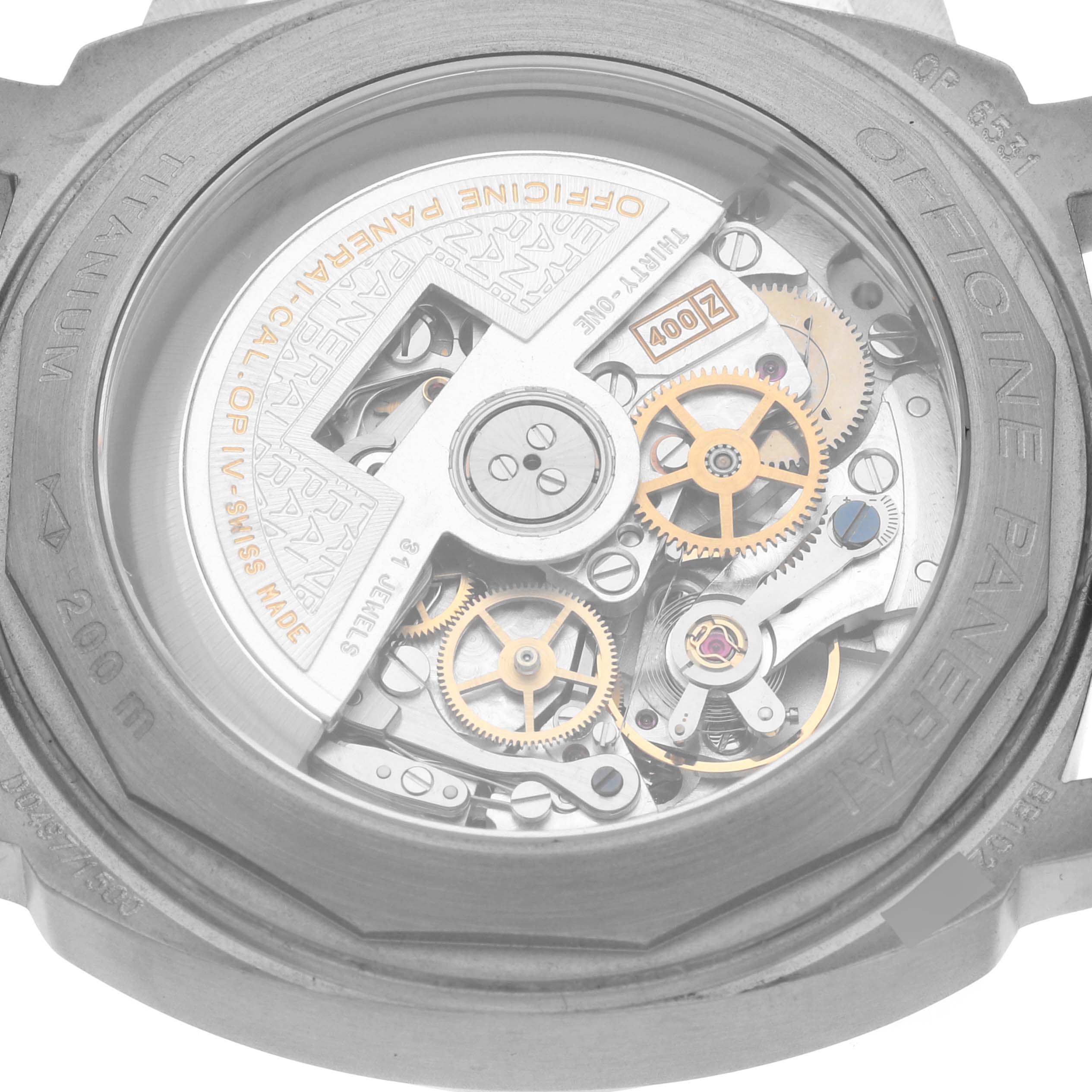 The image shows the back view of a Panerai Luminor PAM00074 Men's Titanium Black Dial PAM00074 Men's Titanium Black Dial watch, highlighting its intricate movement and gears.