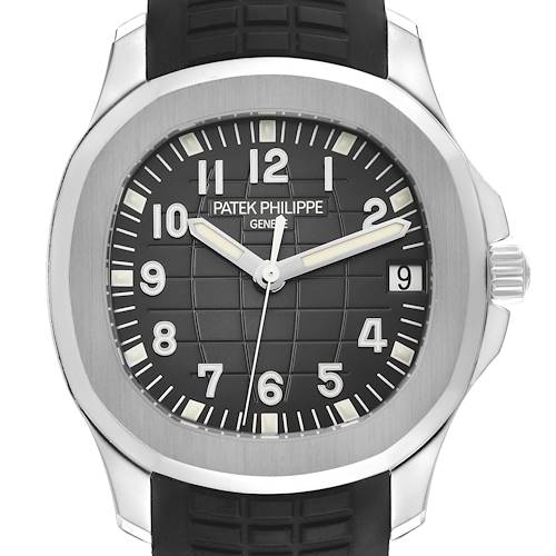 The Patek Philippe Aquanaut watch is shown from a front angle, displaying the dial, case, and part of the strap.