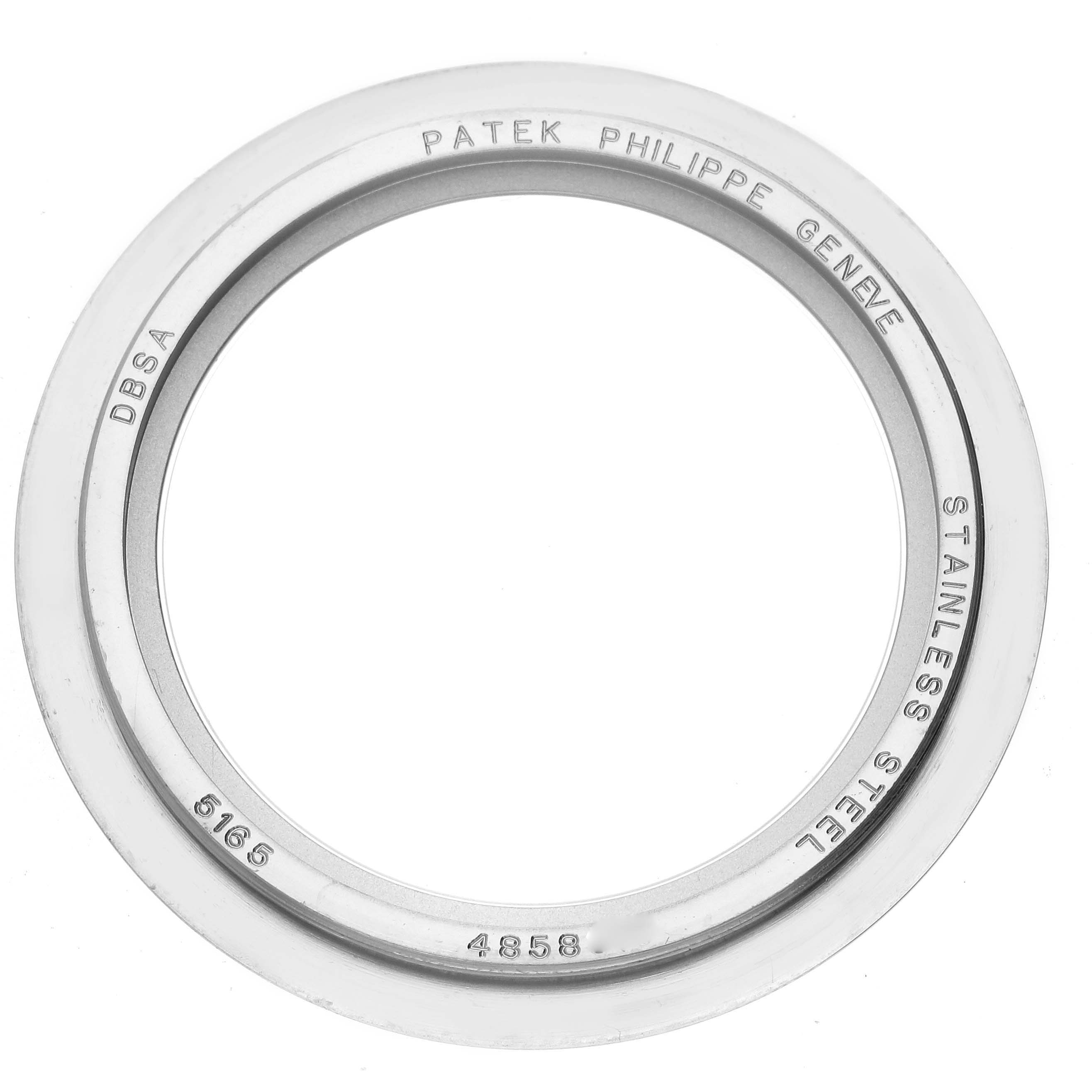 The image shows a stainless steel bezel ring for the Patek Philippe Aquanaut 5165A-001 Men's Stainless Steel Grey Dial 5165A-001 Men's Stainless Steel Grey Dial watch model, viewed from above.