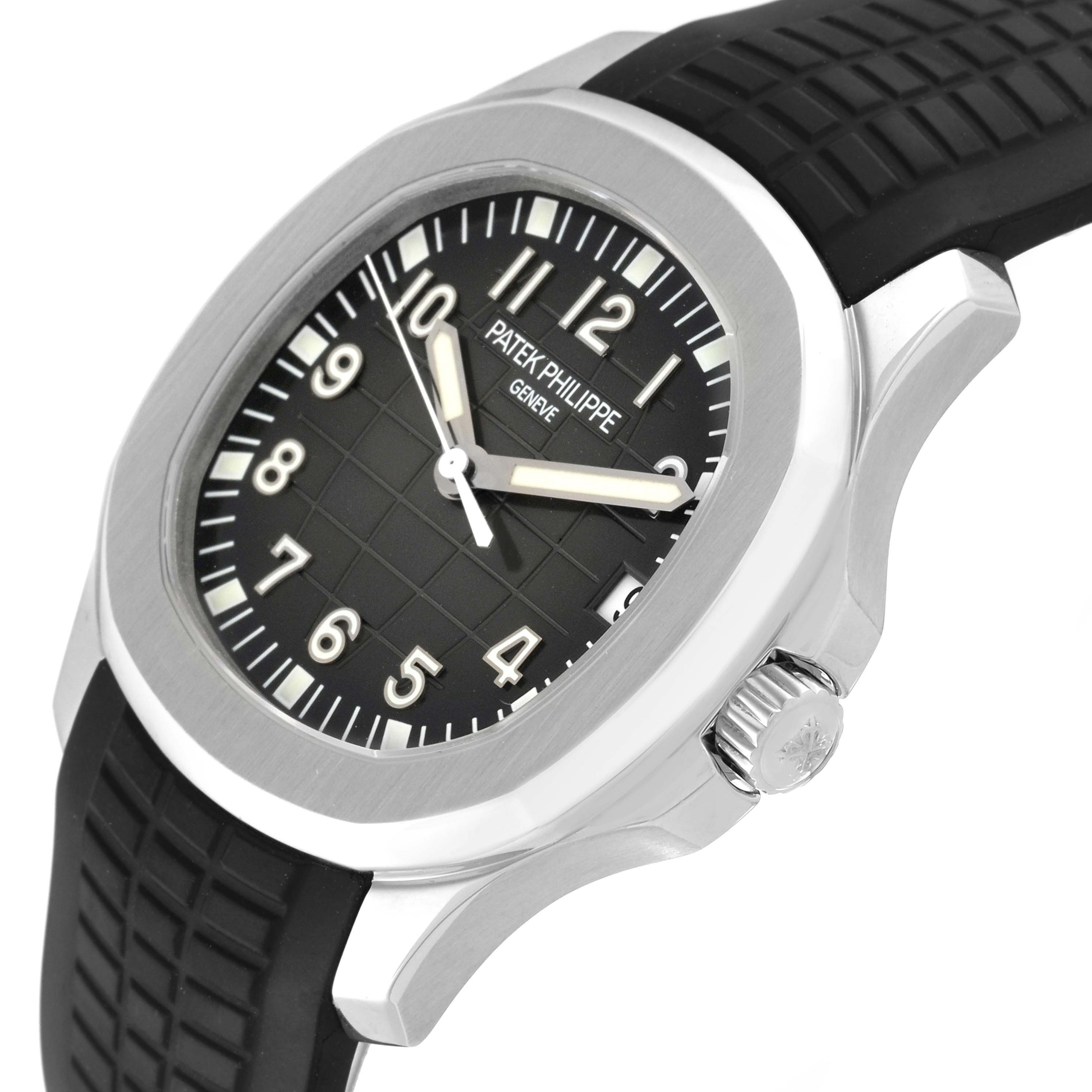 The image shows a side view of the Patek Philippe Aquanaut 5165A-001 Men's Stainless Steel Grey Dial 5165A-001 Men's Stainless Steel Grey Dial, highlighting the case, crown, and part of the black rubber strap.