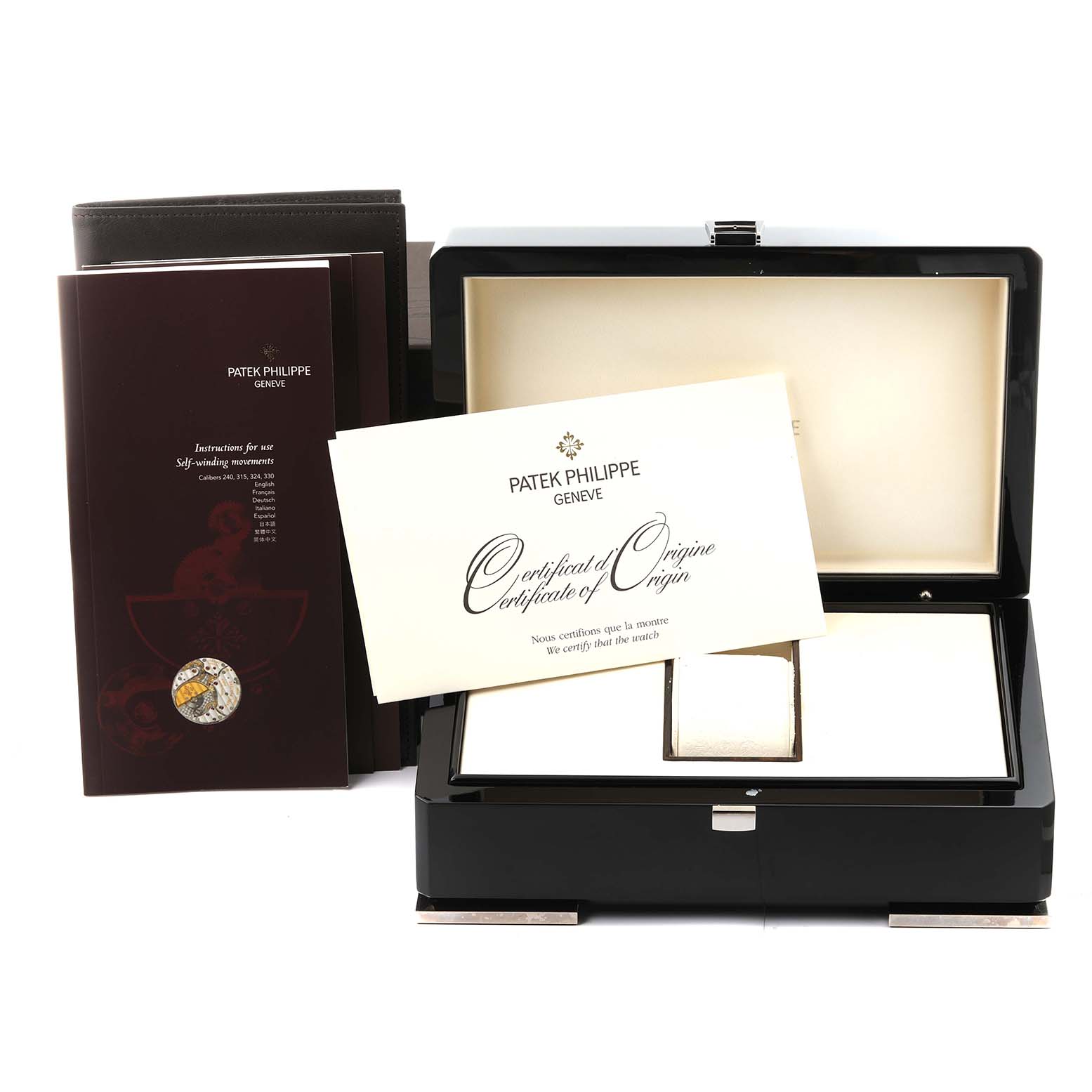 The image shows the Patek Philippe Aquanaut 5165A-001 Men's Stainless Steel Grey Dial 5165A-001 Men's Stainless Steel Grey Dial's packaging, including the box, manuals, and certificate from a front angle.