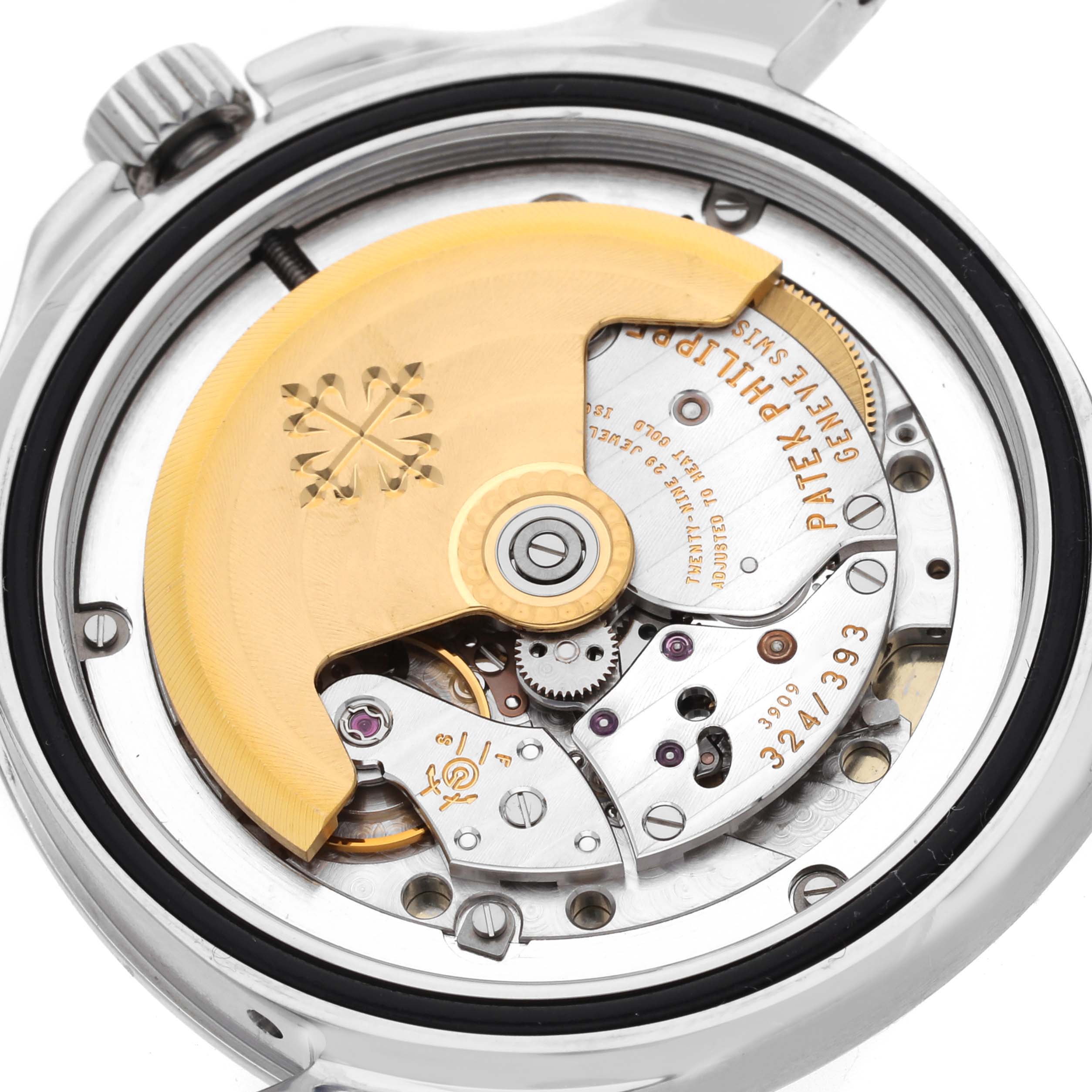 The image shows the movement and rotor of a Patek Philippe Aquanaut 5165A-001 Men's Stainless Steel Grey Dial 5165A-001 Men's Stainless Steel Grey Dial watch from a rear angle.