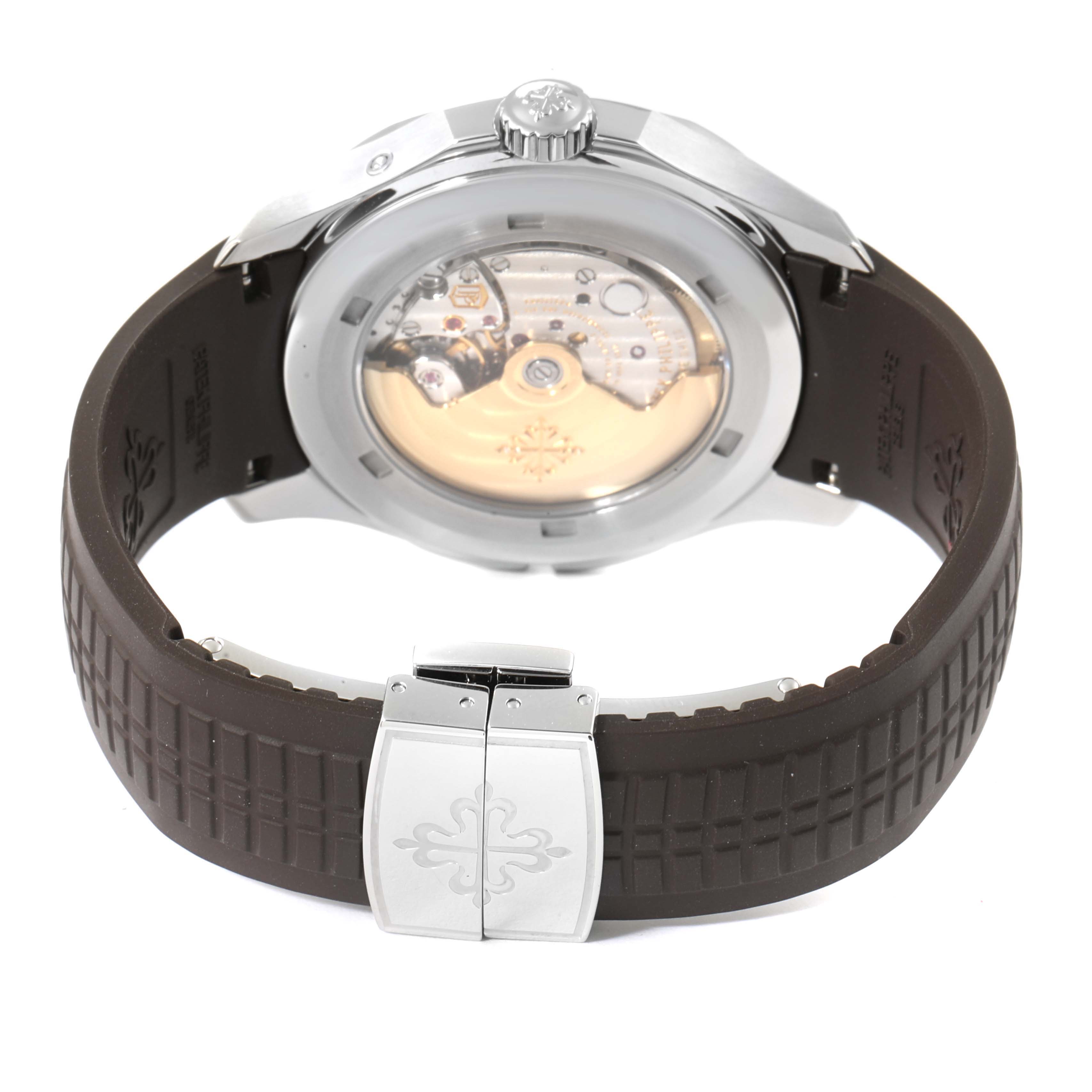 The image shows the back view of a Patek Philippe Aquanaut 5164A Men's Stainless Steel Black Dial 5164A Men's Stainless Steel Black Dial watch, highlighting its movement and clasp.