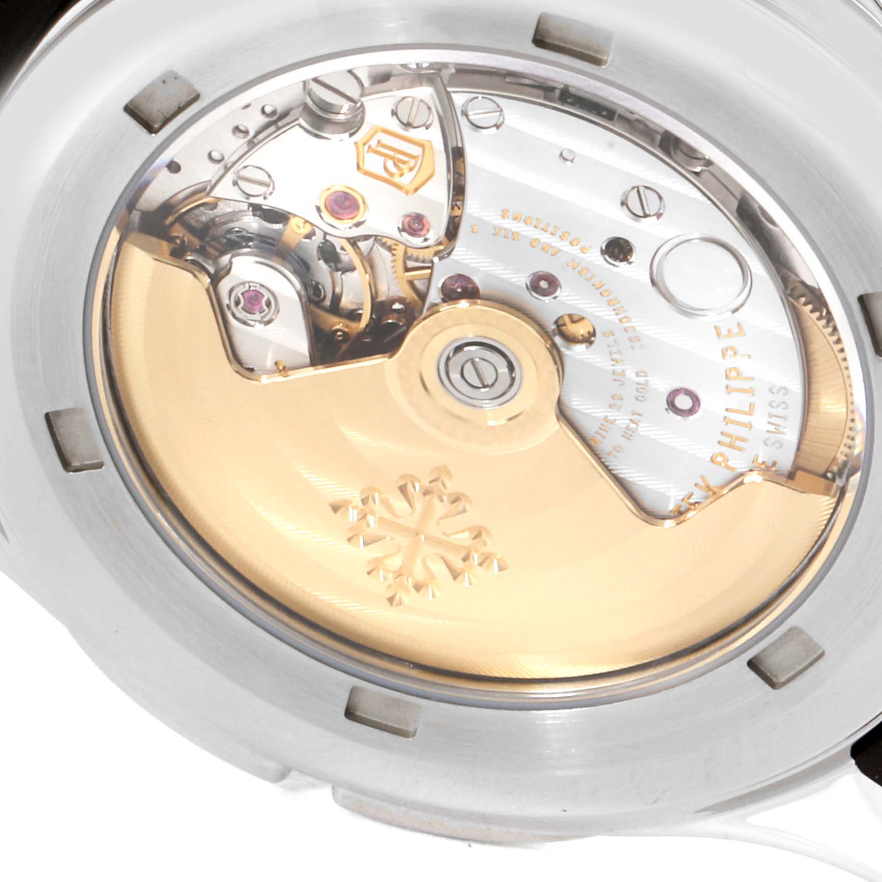 The image shows the back of the Patek Philippe Aquanaut 5164A Men's Stainless Steel Black Dial 5164A Men's Stainless Steel Black Dial watch, highlighting the movement and rotor.