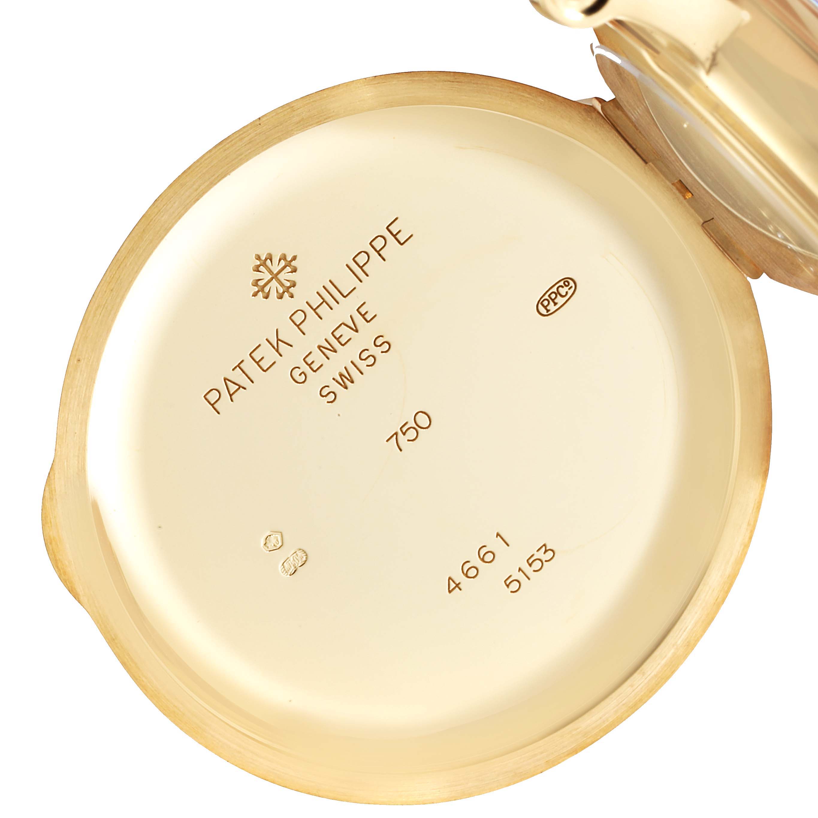 The image shows the inner case back of a Patek Philippe Calatrava 5153J Men's Yellow Gold Silver Dial 5153J Men's Yellow Gold Silver Dial watch with inscriptions and hallmarks.