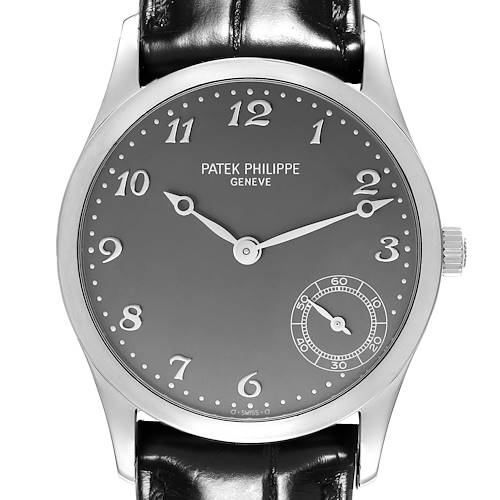 The Patek Philippe Calatrava watch is shown from the front, displaying the dial, hands, and leather strap.