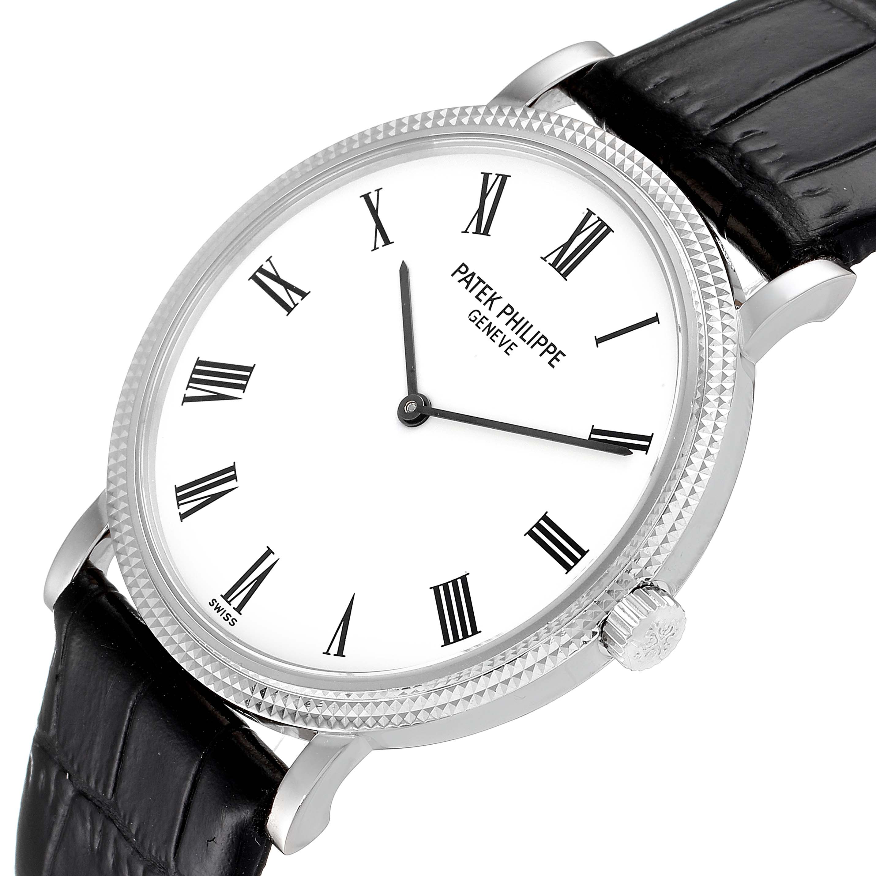 This image shows a Patek Philippe Calatrava 5120G Men's White Gold White Dial 5120G Men's White Gold White Dial watch from a slightly angled front view, highlighting its dial, bezel, and strap.