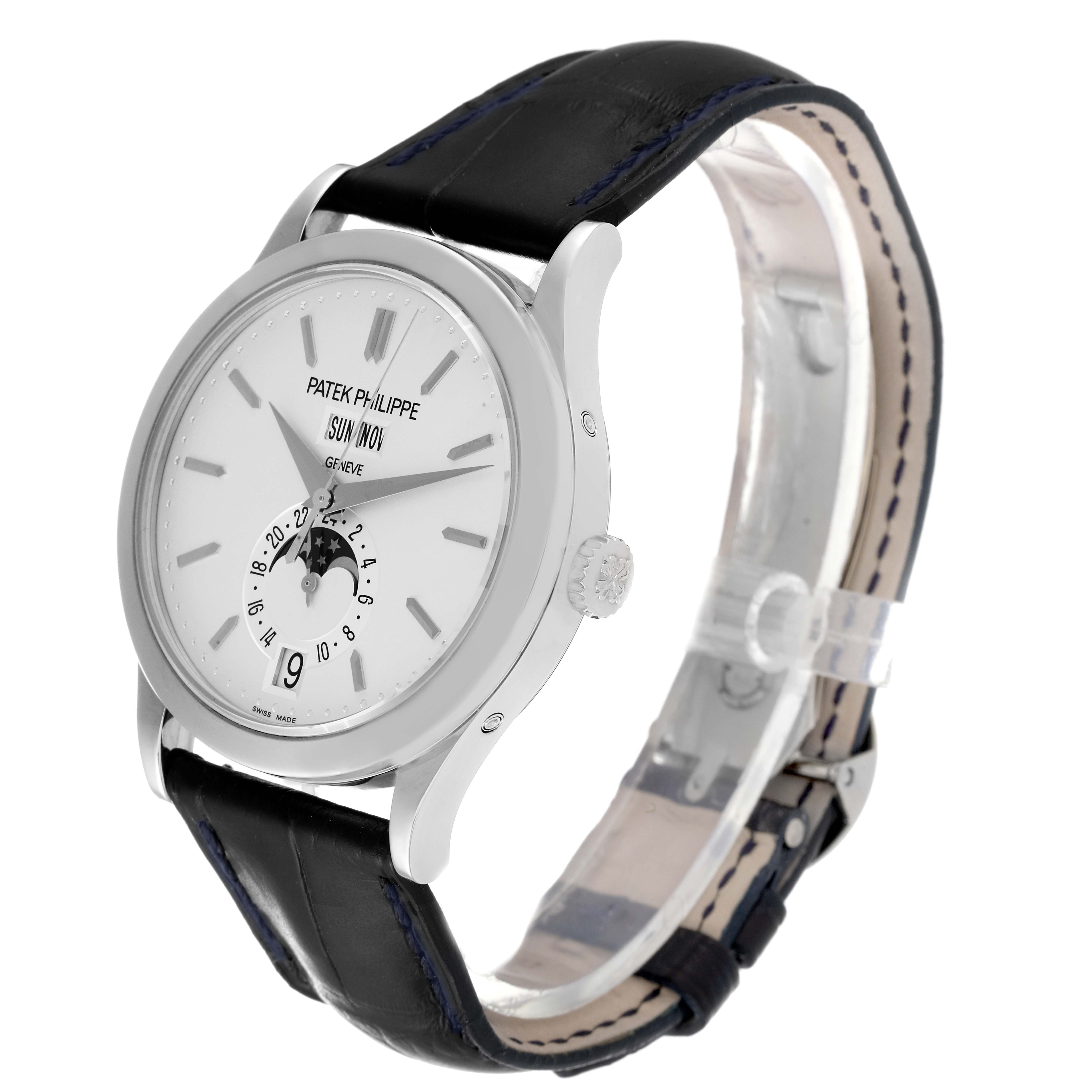 The image shows a Patek Philippe Complications 5396G - 011 Men's White Gold Silver Dial 5396G - 011 Men's White Gold Silver Dial model watch, viewed from an oblique angle, highlighting the face, strap, and crown.