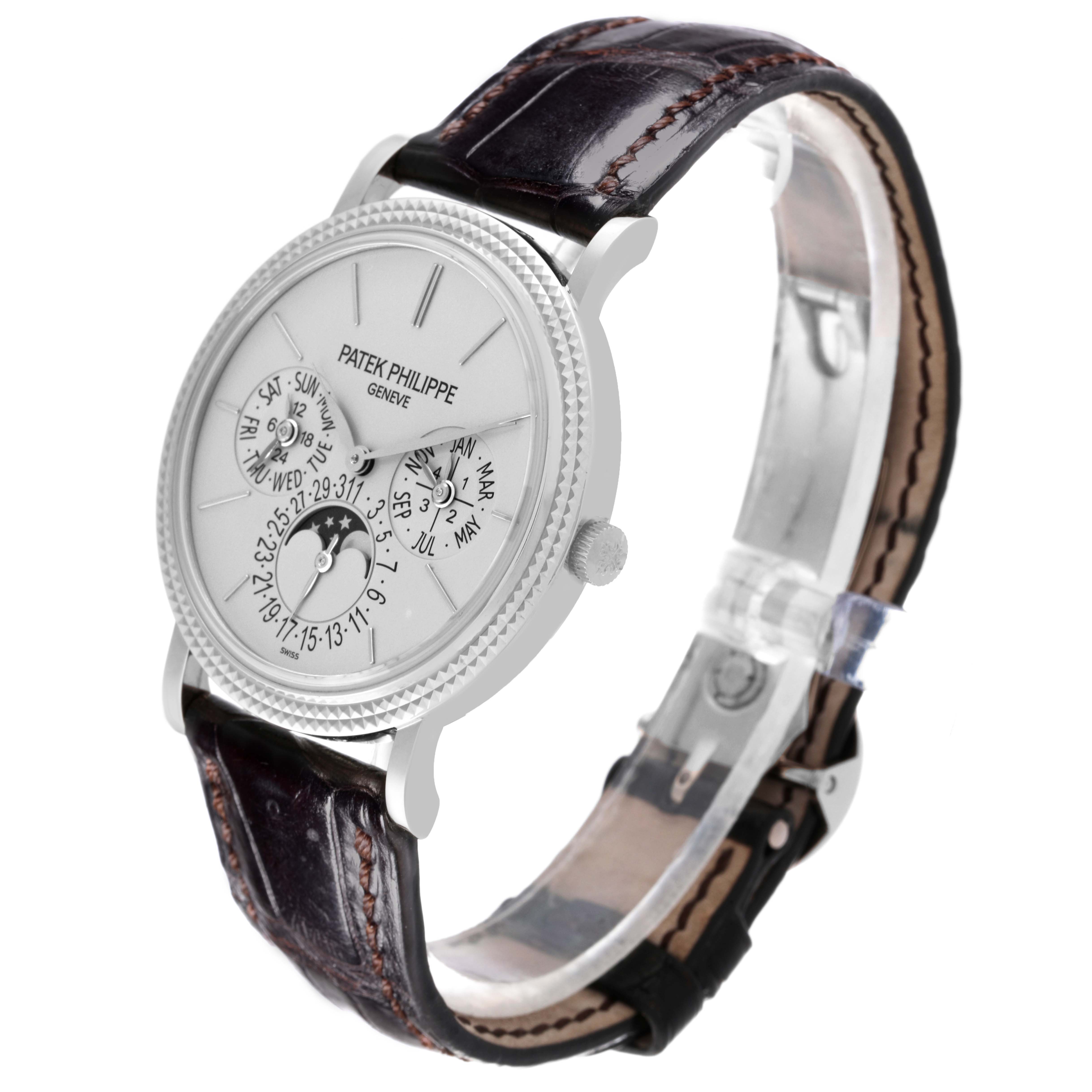 The Patek Philippe Complications 5139G-001 Men's White Gold Grey Dial 5139G-001 Men's White Gold Grey Dial watch is shown at a three-quarter angle, displaying its face, strap, and side crown.