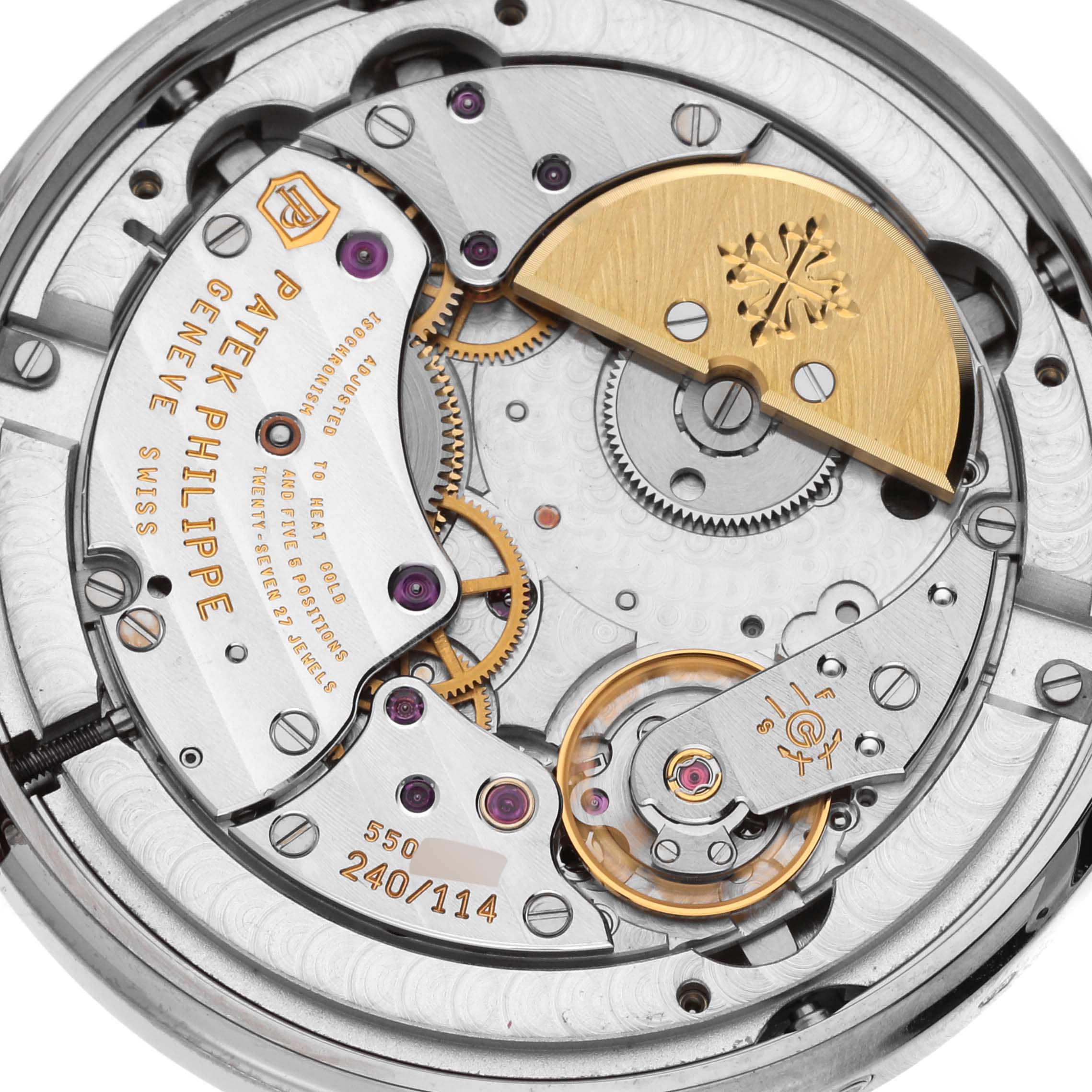 The image shows the intricate movement of the Patek Philippe Complications 5139G-001 Men's White Gold Grey Dial 5139G-001 Men's White Gold Grey Dial watch from a top-down angle, highlighting its gears and rotor.