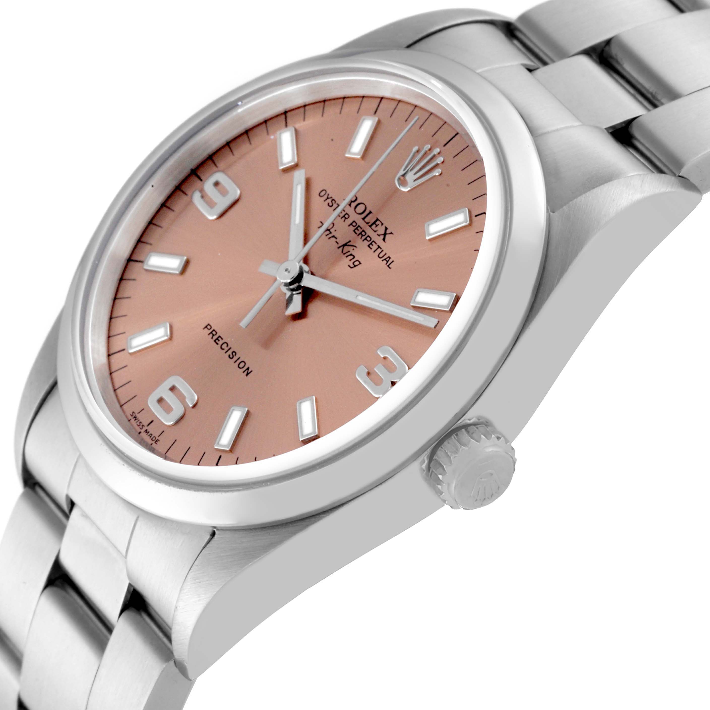 The Rolex Air-King 14000 Men's Stainless Steel Pink Dial 14000 Men's Stainless Steel Pink Dial watch is shown at a tilted angle, displaying the face, crown, and part of the bracelet.