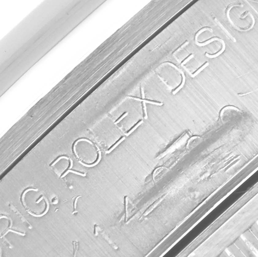 The image shows a close-up of the engraving on the side of a Rolex Air-King 14000 Men's Stainless Steel Pink Dial 14000 Men's Stainless Steel Pink Dial watch.