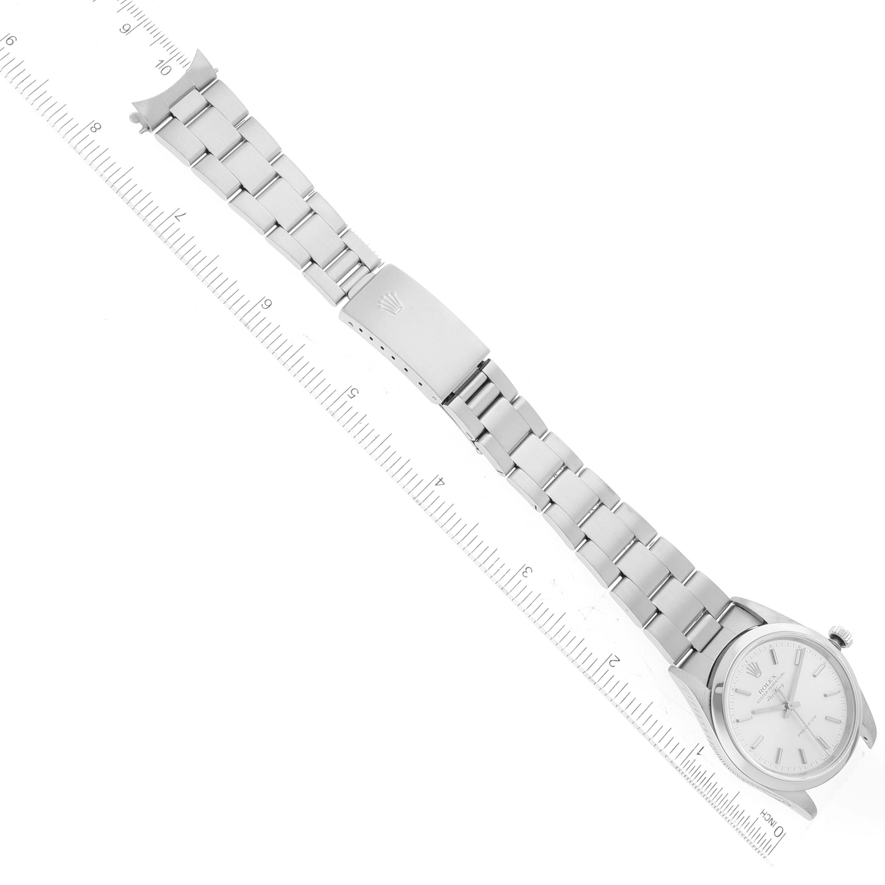 The image shows a Rolex Air-King 14000 Men's Stainless Steel Silver Dial 14000 Men's Stainless Steel Silver Dial watch laid flat with an extended bracelet and a ruler for scale.