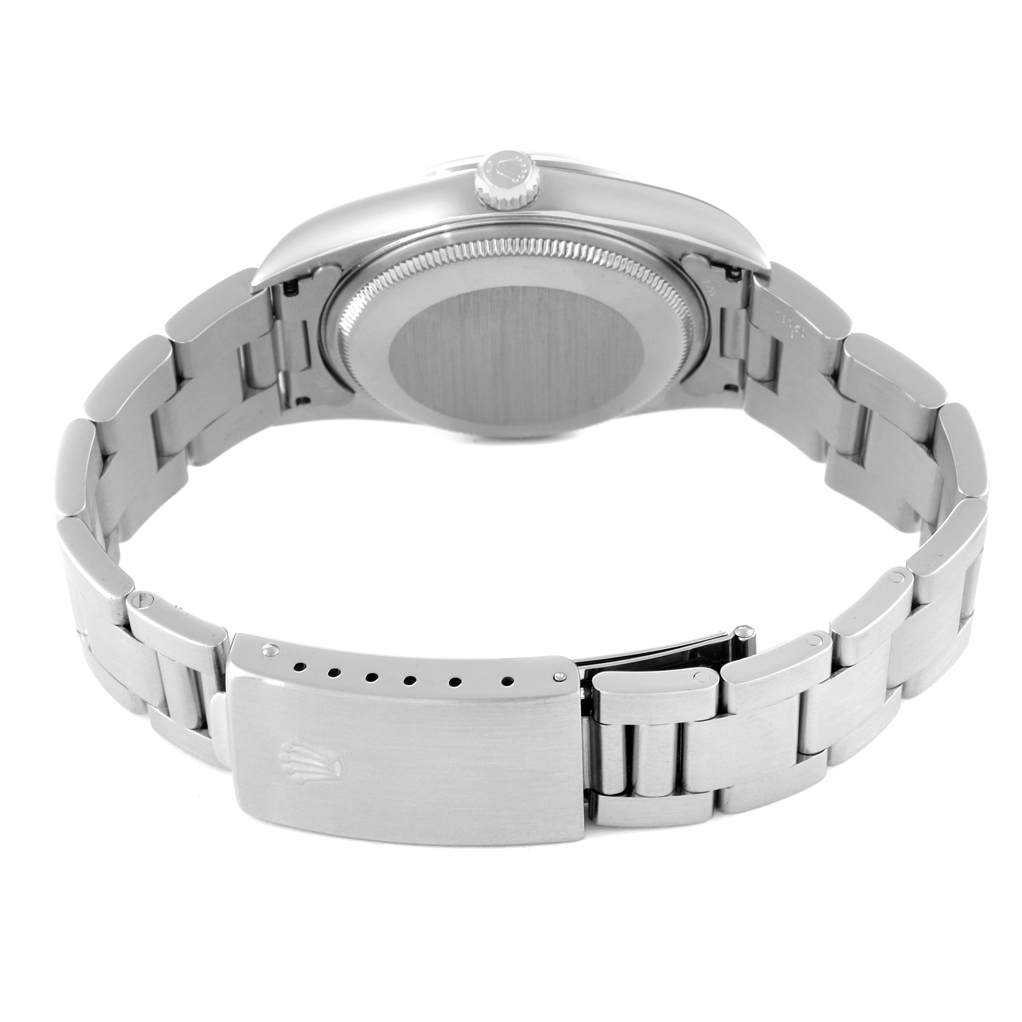 The image shows the back view of a Rolex Air-King 14000 Men's Stainless Steel Silver Dial 14000 Men's Stainless Steel Silver Dial watch highlighting the case back, crown, and bracelet with clasp.