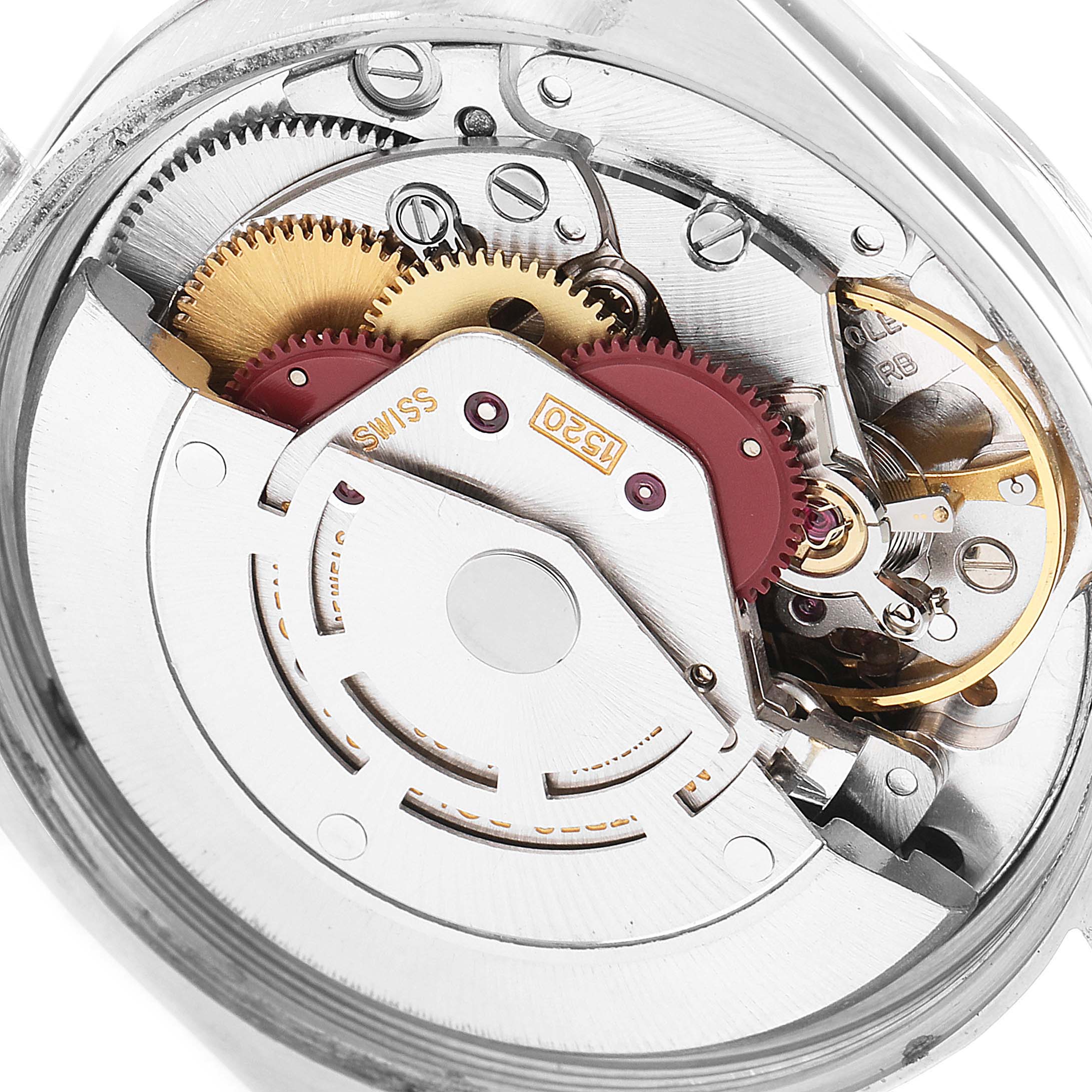 This image shows a close-up of the internal mechanisms of the Rolex Vintage Collection 5500 Men's Stainless Steel Silver Dial 5500 Men's Stainless Steel Silver Dial watch, highlighting gears and components.