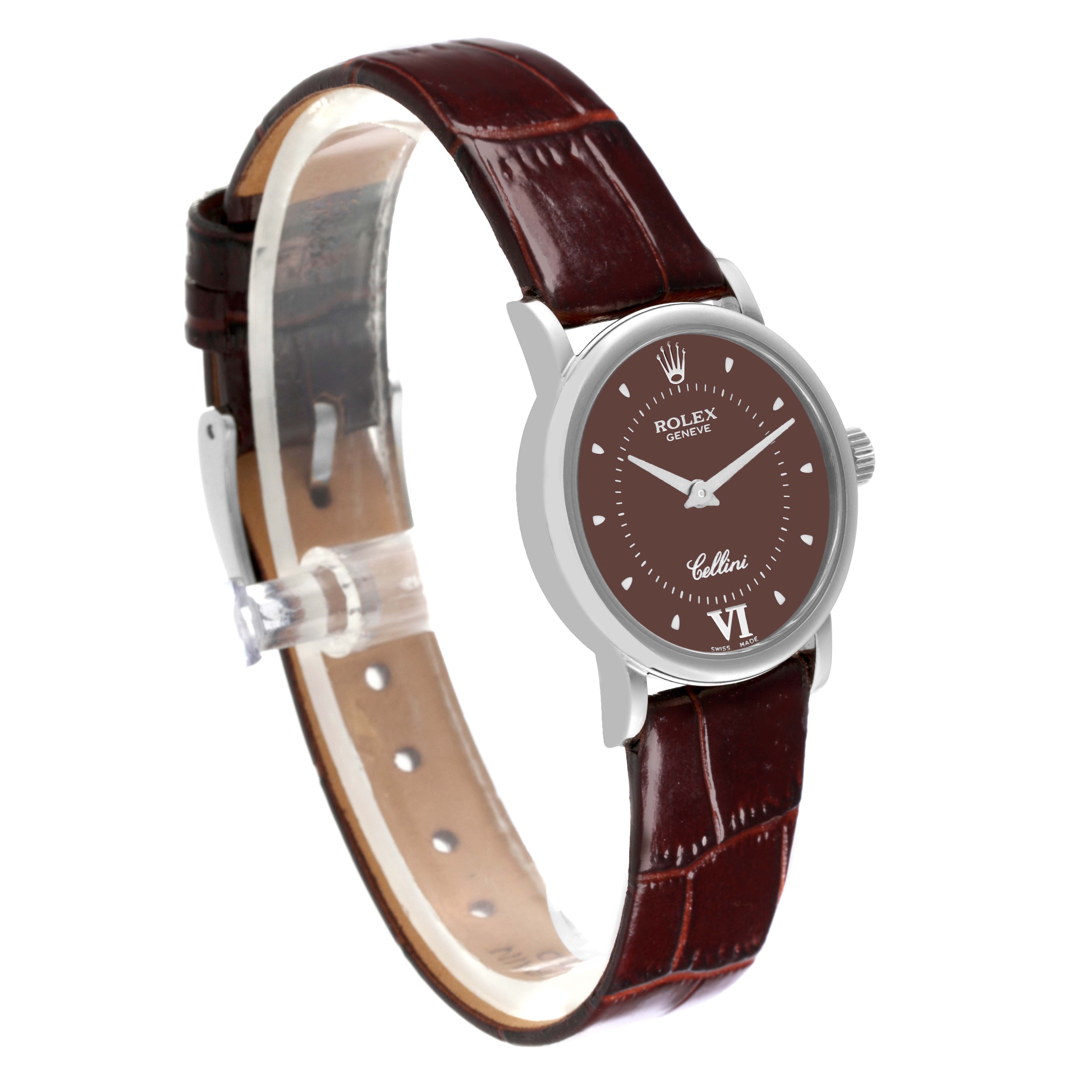 The Rolex Cellini 6110 Women's White Gold Brown Dial 6110 Women's White Gold Brown Dial watch is shown at a slight angle, highlighting its face, crown, and leather strap.