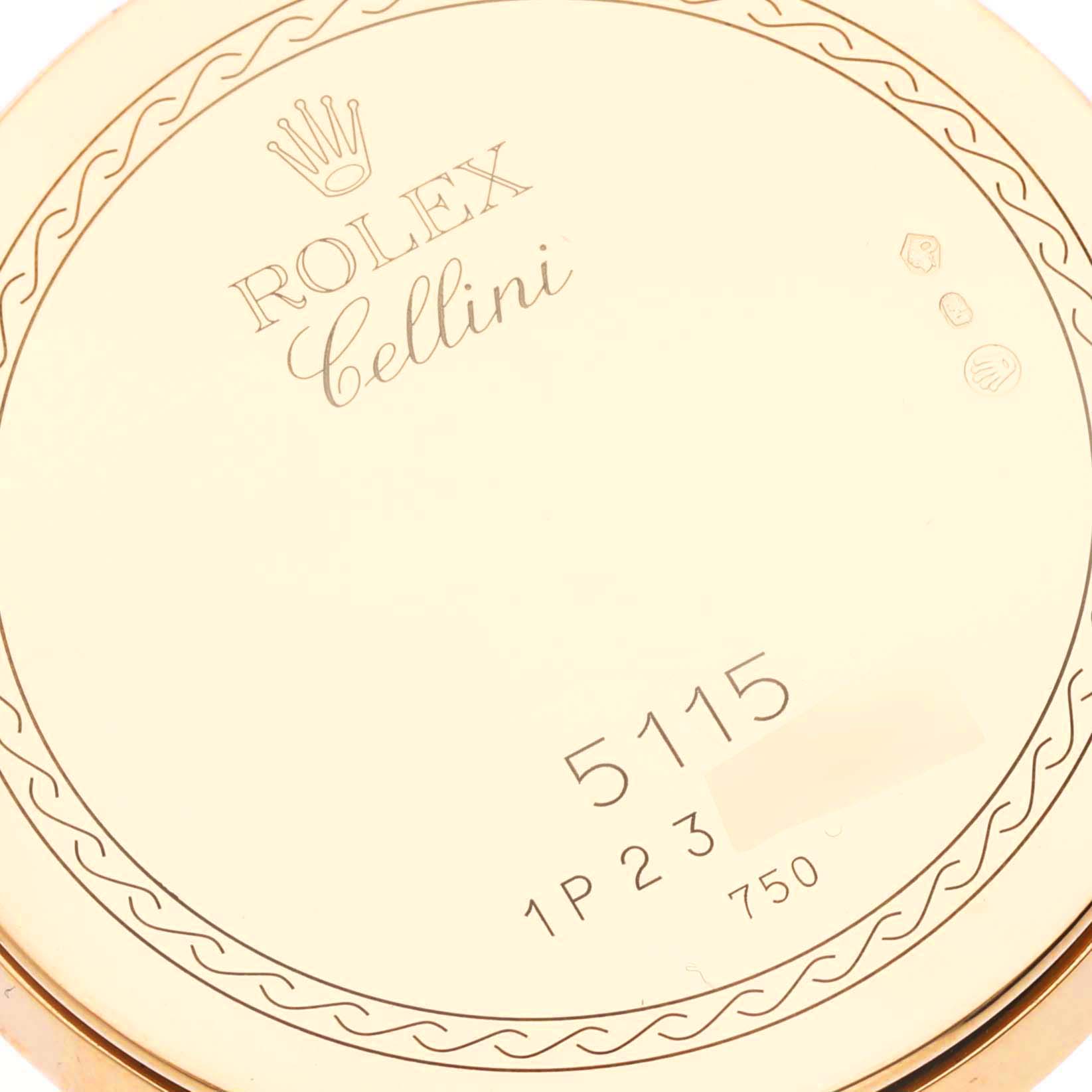 The image shows the back of a Rolex Cellini 5115 Men's Yellow Gold Champagne Dial 5115 Men's Yellow Gold Champagne Dial watch, displaying the model number and hallmark engravings.