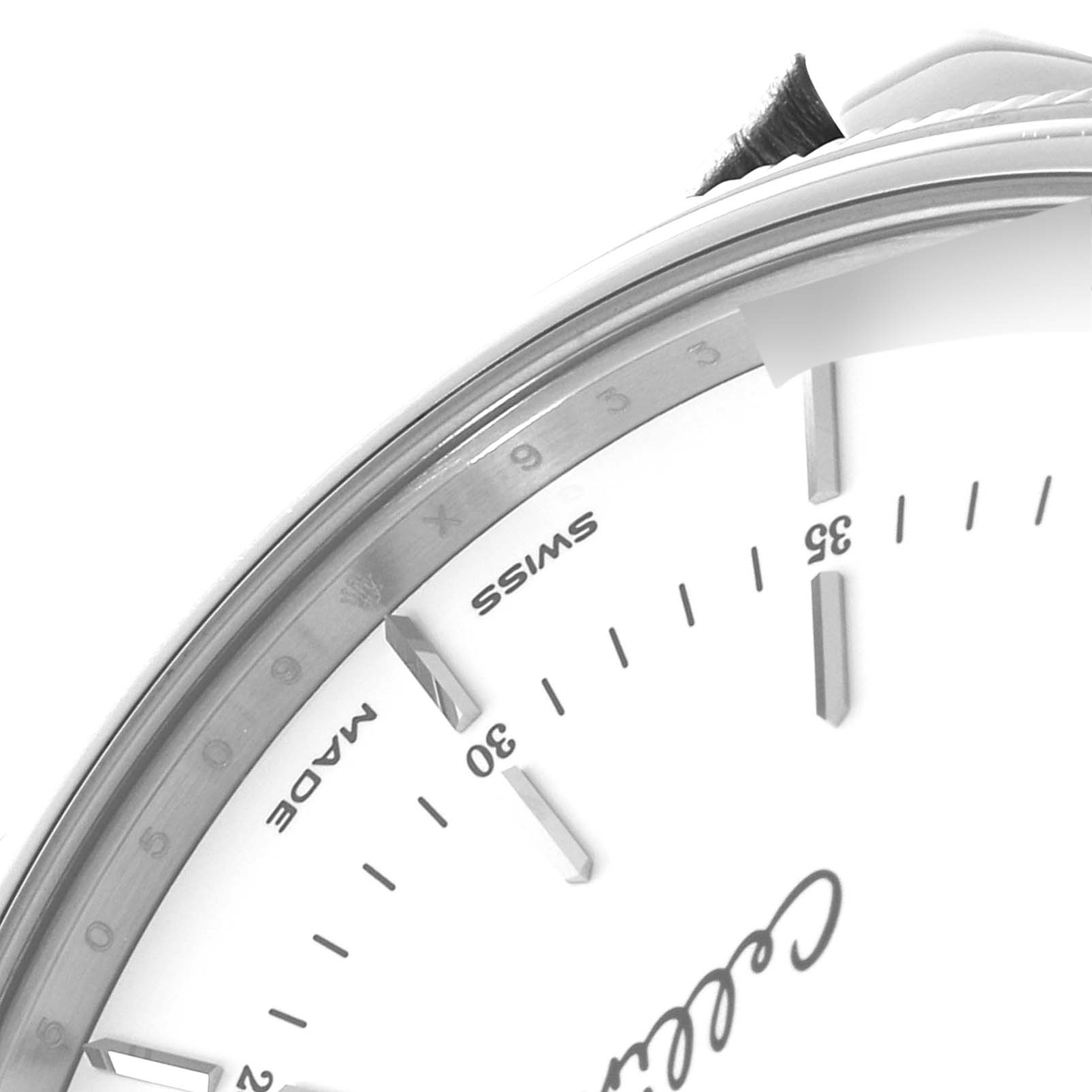 The image shows a close-up angle of the dial and bezel of the Rolex Cellini 50509 Men's White Gold White Dial 50509 Men's White Gold White Dial watch.