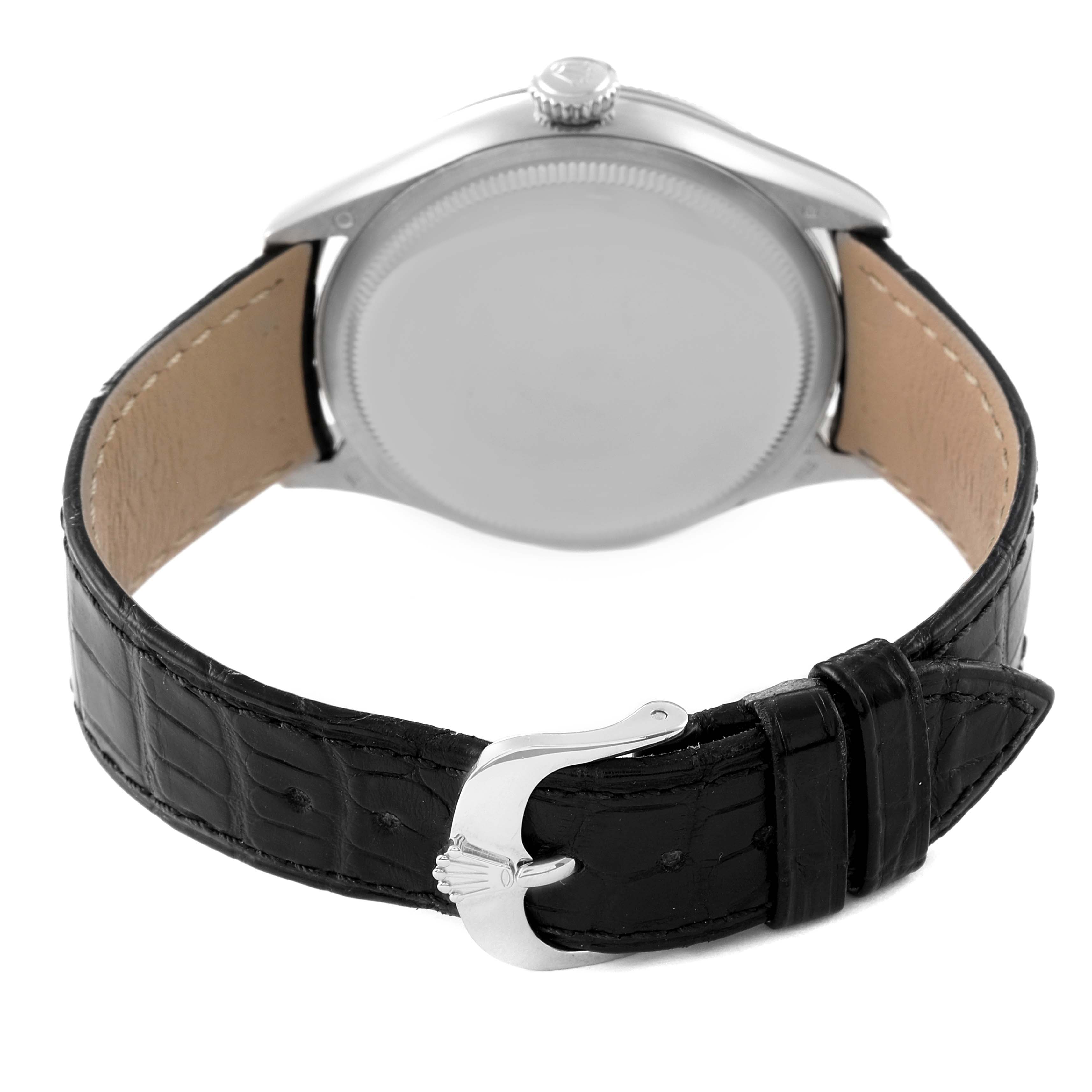 The image shows the back of a Rolex Cellini 50509 Men's White Gold White Dial 50509 Men's White Gold White Dial watch, highlighting the case back and black leather strap with buckle.