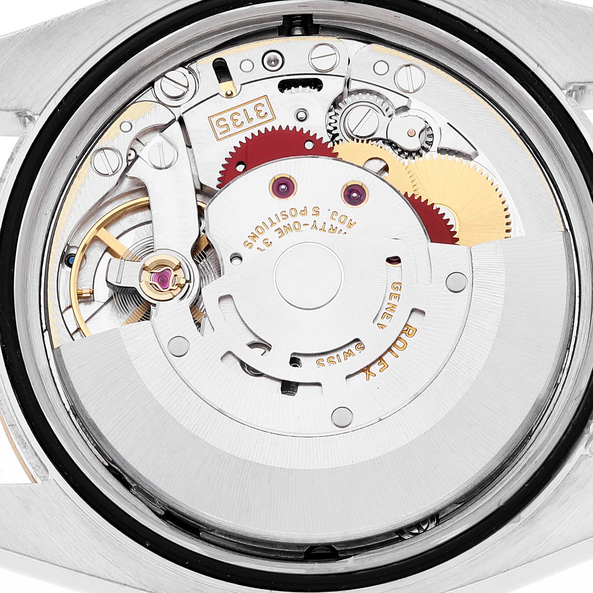 This is a close-up view of the internal mechanical movement of a Rolex Datejust 116233 Men's Steel and Gold (two tone) Black Dial 116233 Men's Steel and Gold (two tone) Black Dial watch.