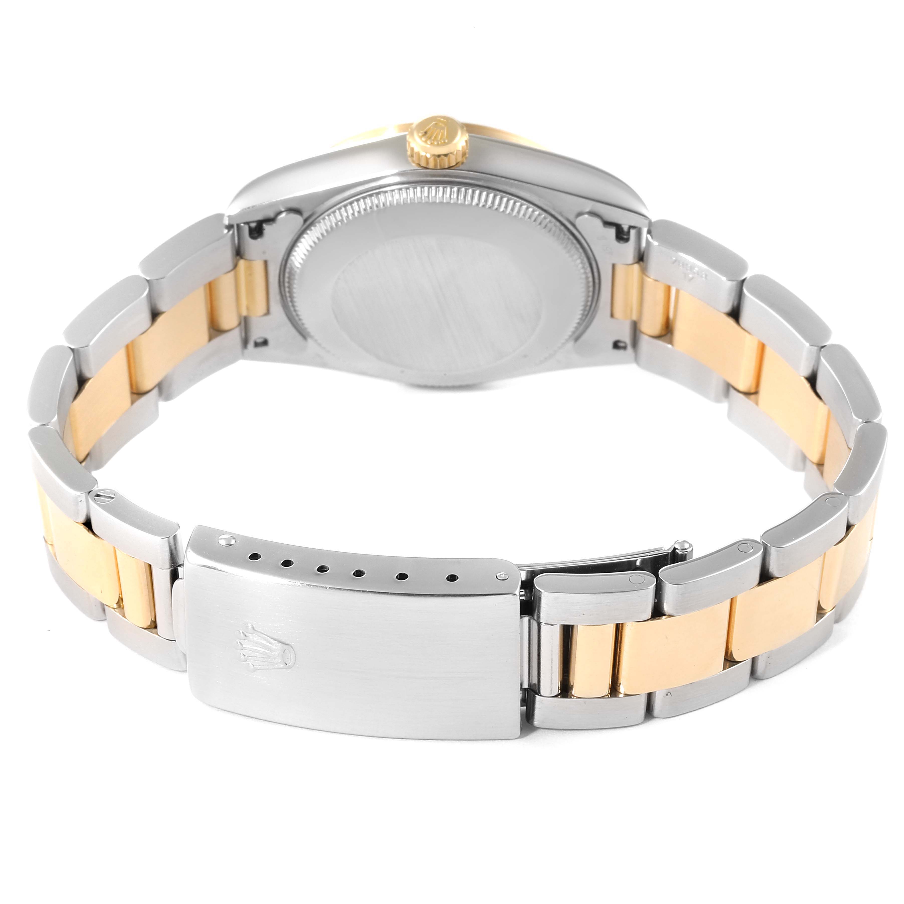 This image shows the back view of a Mid-Size Rolex watch, including the case back, bracelet, and clasp.