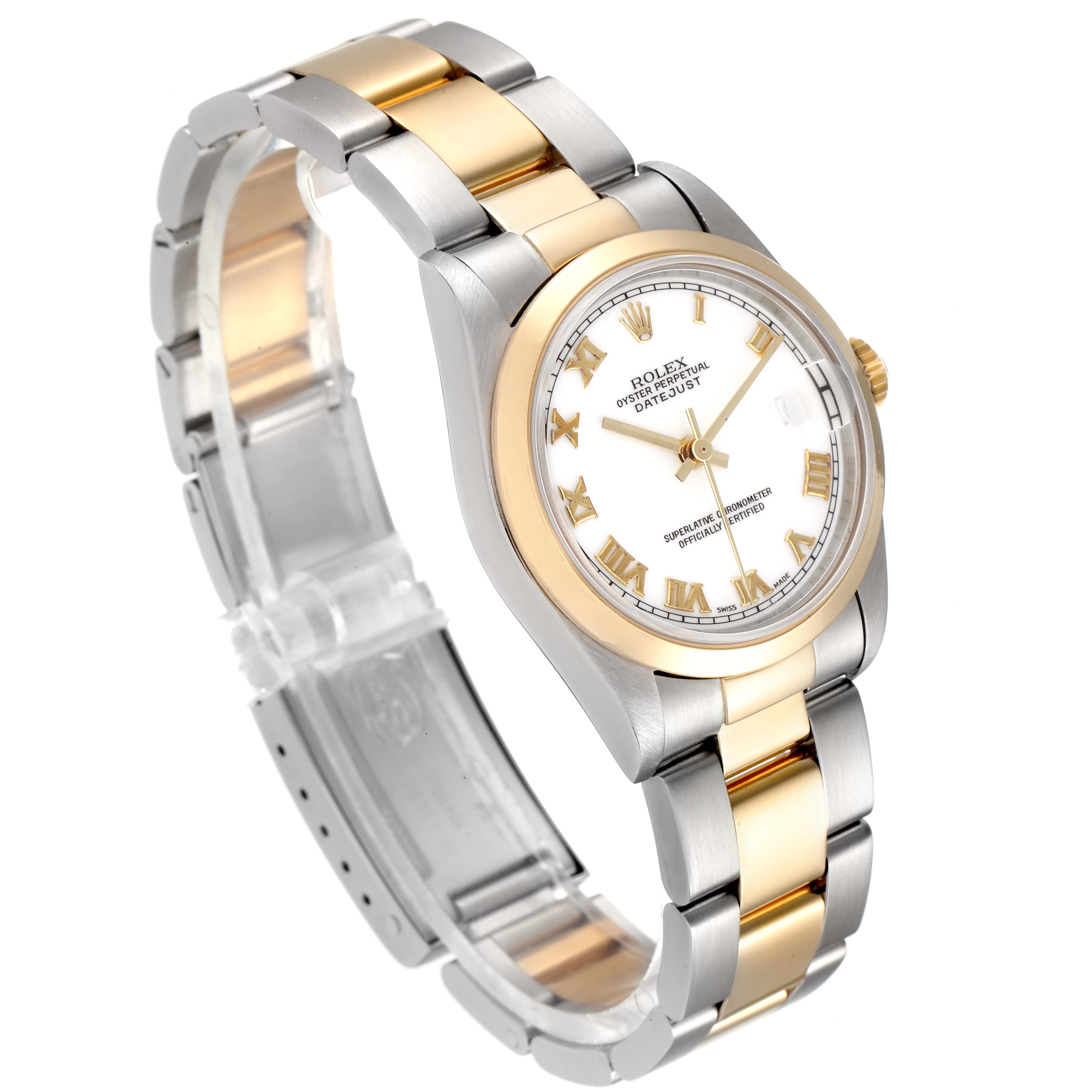The image shows a side-angle view of a two-tone Rolex Mid-Size 78243 Women
s Steel and Gold (two tone) White Dial 78243 Women
s Steel and Gold (two tone) White Dial Oyster Perpetual Datejust watch, displaying its bracelet, case, and dial.
