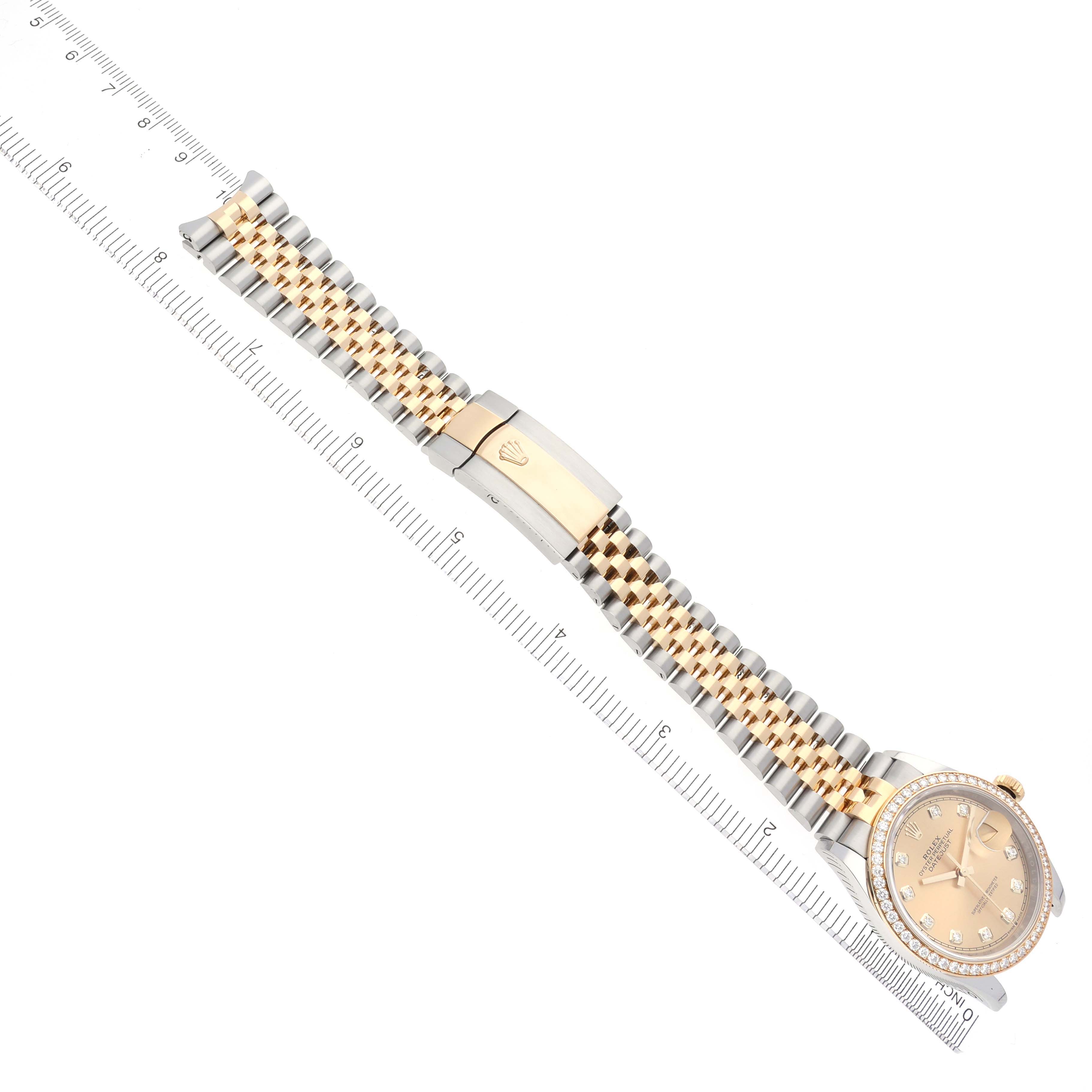 The Rolex Datejust 126283 Men's Steel and Gold (two tone) Champagne Dial 126283 Men's Steel and Gold (two tone) Champagne Dial watch is shown at a diagonal angle, highlighting its face, bracelet, and clasp.