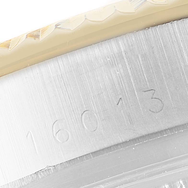 The image shows a close-up angle of the engraved serial number on the side of the Rolex Vintage Collection 16013 Men's Steel and Gold (two tone) Champagne Dial 16013 Men's Steel and Gold (two tone) Champagne Dial model.