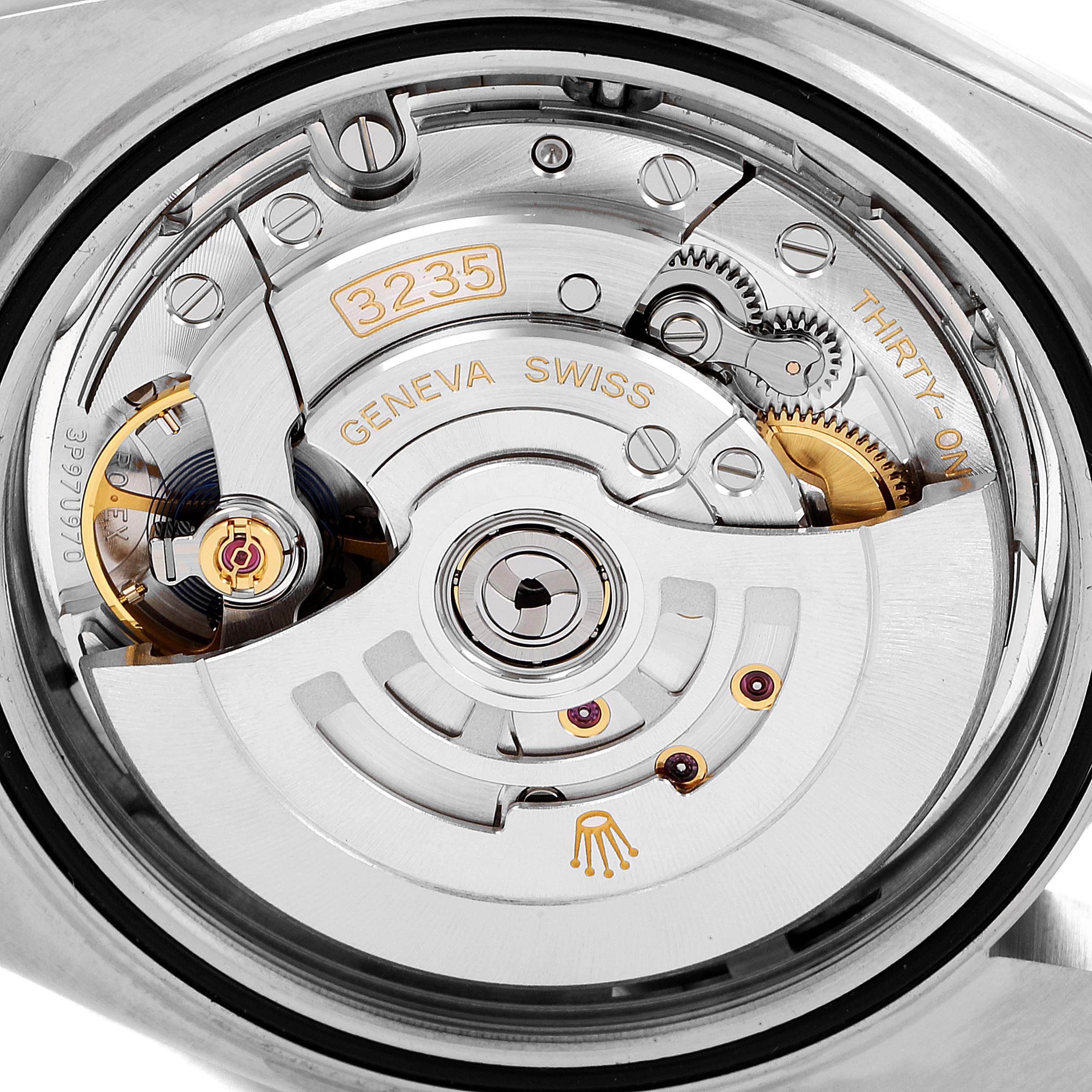 The image shows a close-up view of the movement mechanism inside the Rolex Datejust 41 126334 Men
s Stainless Steel Silver Dial 126334 Men
s Stainless Steel Silver Dial, model 3235.