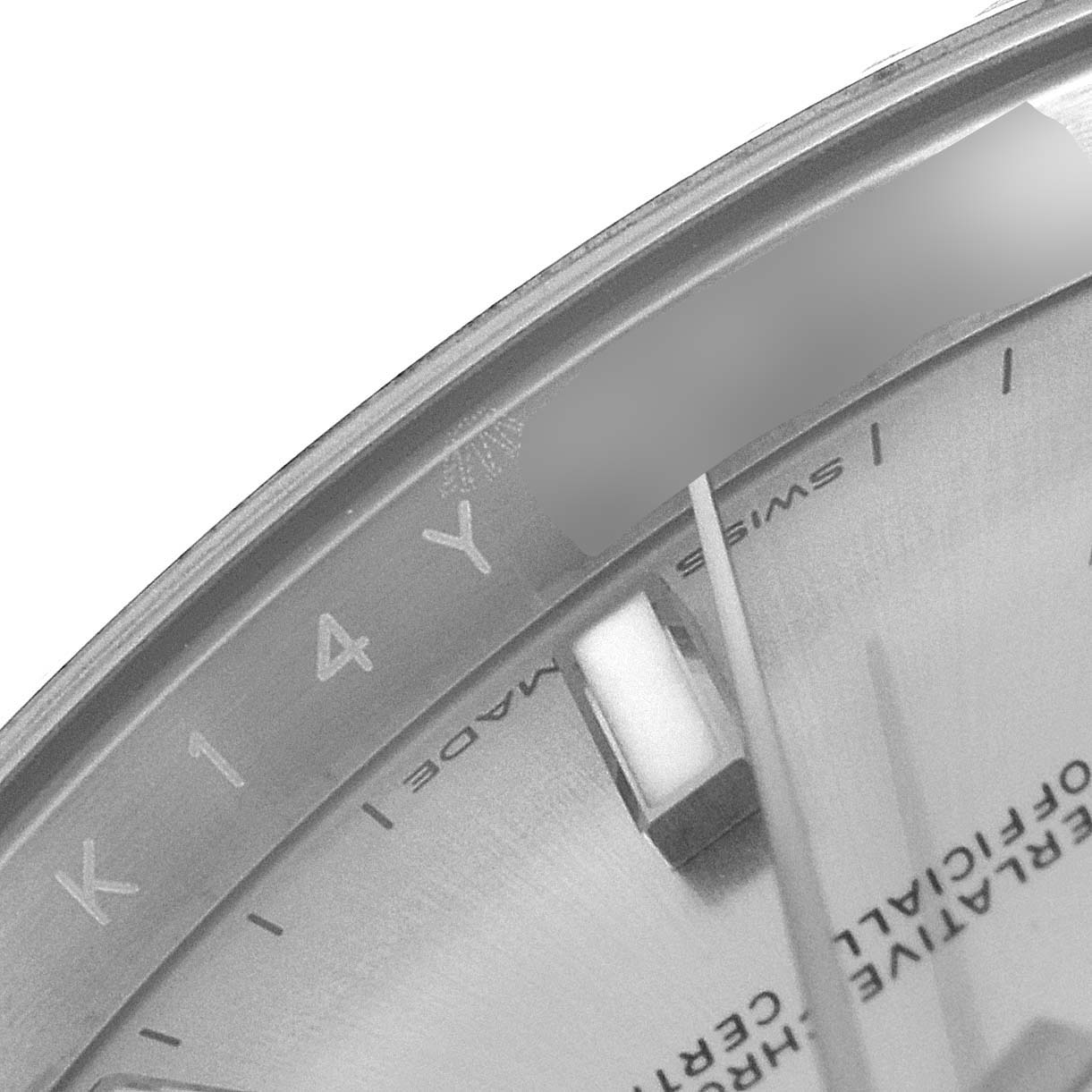 The image shows a close-up of the dial and date window at the 12 o
clock position of the Rolex Datejust 41 126334 Men
s Stainless Steel Silver Dial 126334 Men
s Stainless Steel Silver Dial watch.