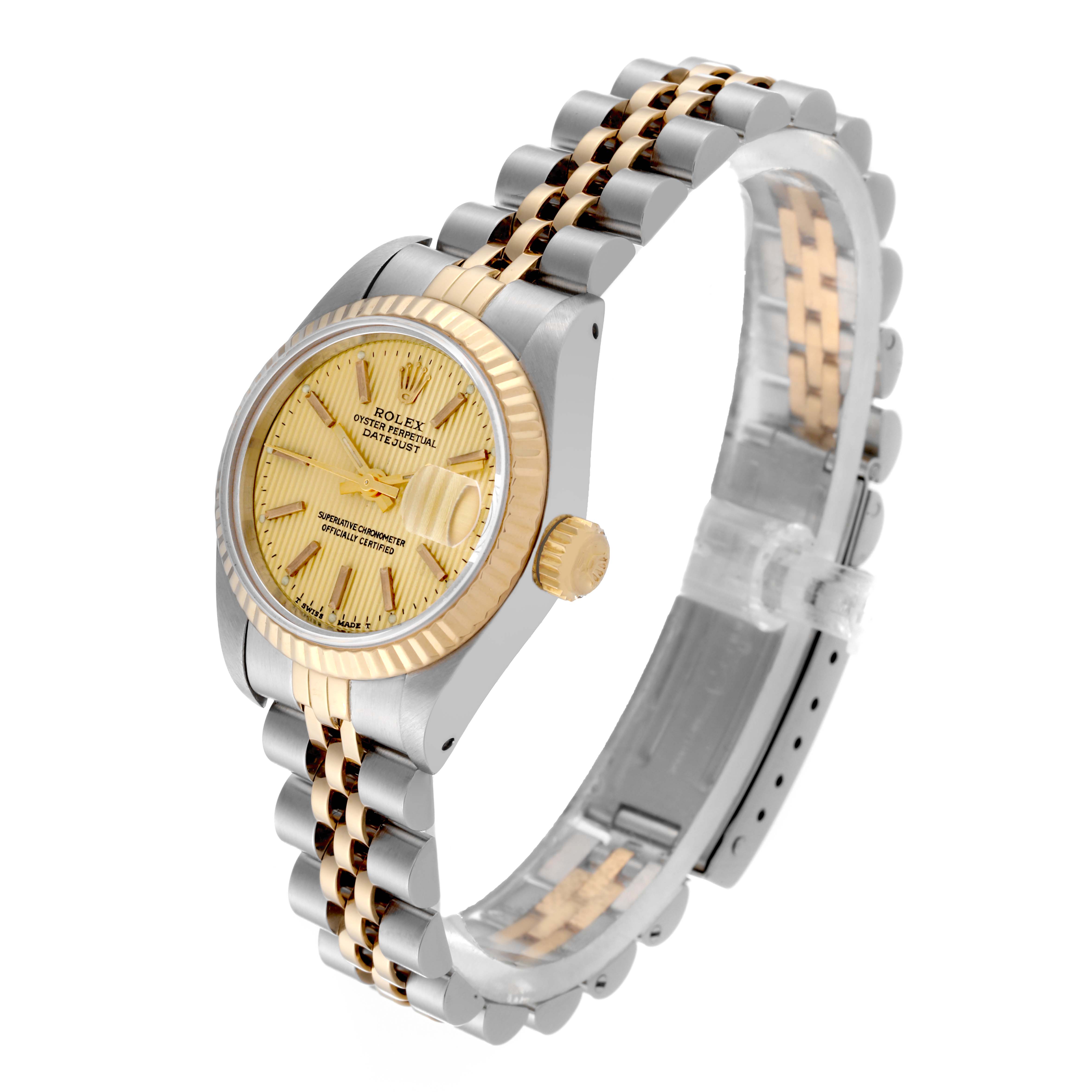 The Rolex Datejust 69173 Women
s Steel and Gold (two tone) Champagne Dial 69173 Women
s Steel and Gold (two tone) Champagne Dial watch is shown at a side angle, highlighting the dial, bezel, crown, and two-tone bracelet.