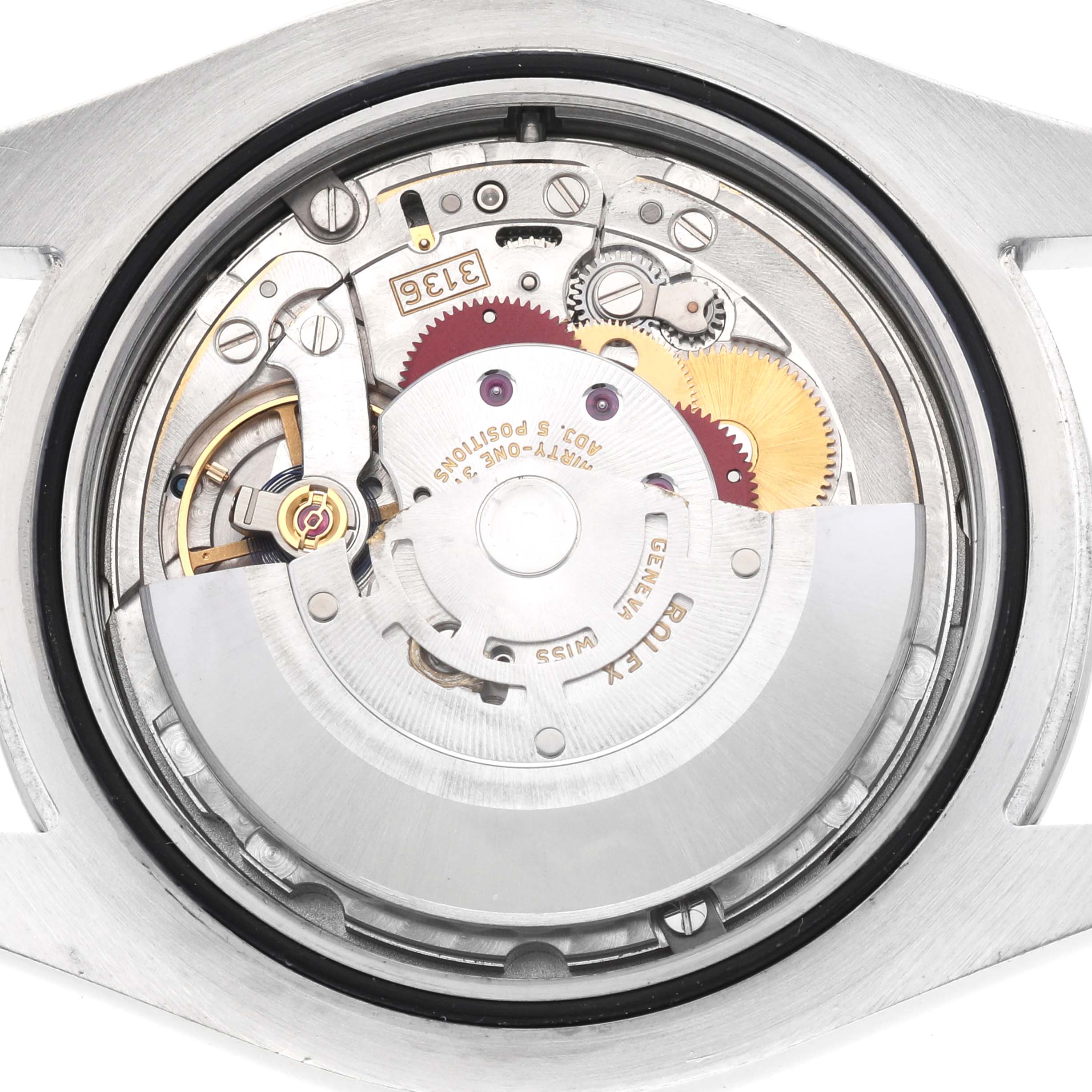 The image shows the movement mechanism of the Rolex Datejust 41 116300 Men
s Stainless Steel Blue Dial 116300 Men
s Stainless Steel Blue Dial from a top-down angle.