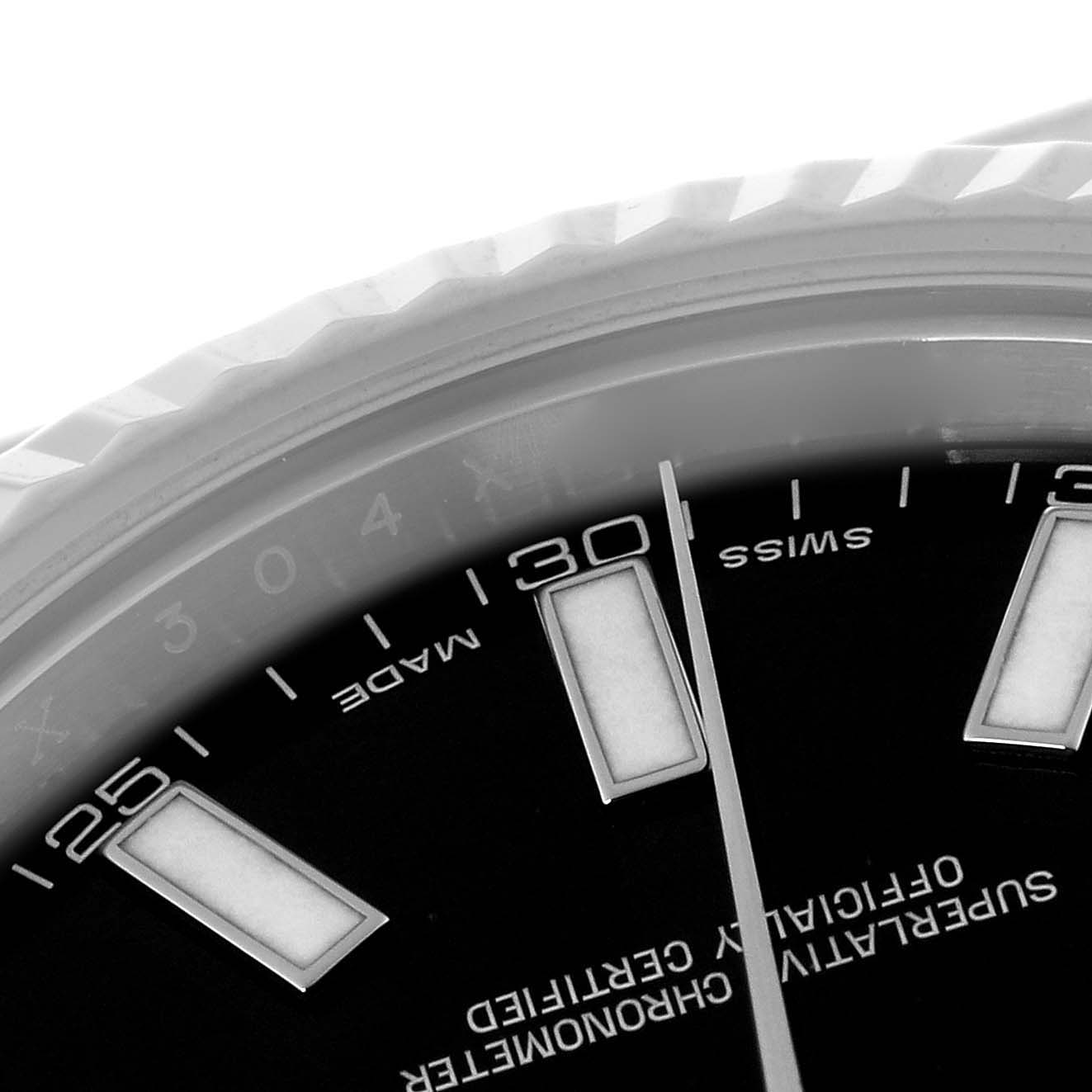 The image shows a close-up of the dial and fluted bezel of a Rolex Datejust 41 116334 Men
s Stainless Steel Black Dial 116334 Men
s Stainless Steel Black Dial watch, highlighting the hour markers and text.