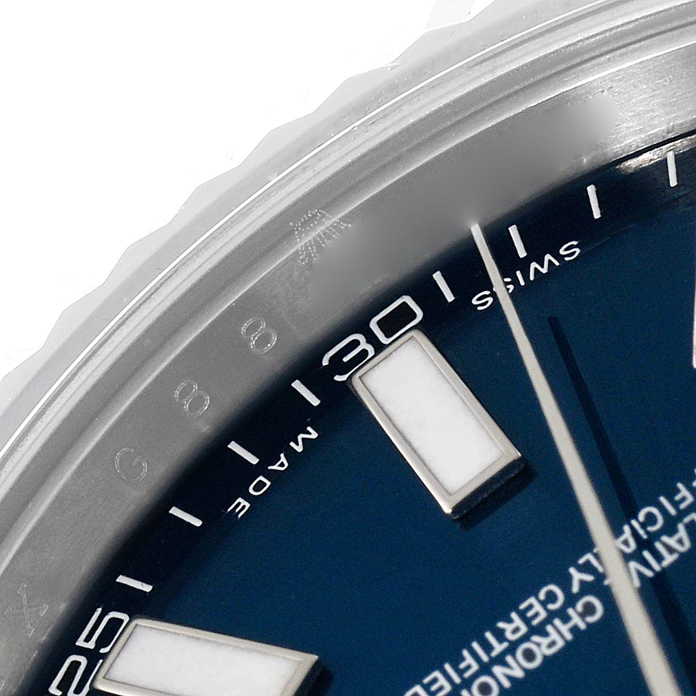 The image shows a close-up of the dial and bezel of the Rolex Datejust 41 116334 Men's Stainless Steel Blue Dial 116334 Men's Stainless Steel Blue Dial, highlighting the minute markers and “Swiss Made” text.