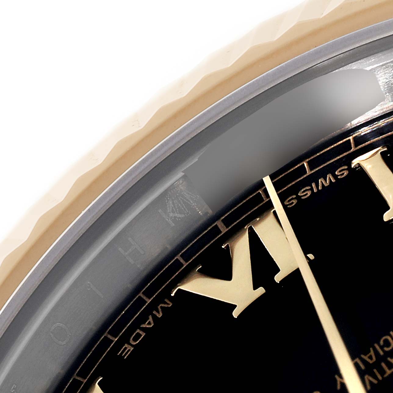 The image shows a close-up of the bezel, dial, and part of the hour hand and Roman numerals of a Rolex Datejust 116333 Men
s Steel and Gold (two tone) Black Dial 116333 Men
s Steel and Gold (two tone) Black Dial watch.