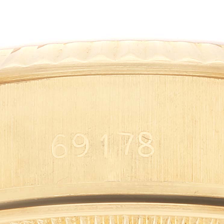 This image shows a close-up of the side of a Rolex President 69178 Women's Yellow Gold Champagne Dial 69178 Women's Yellow Gold Champagne Dial model, displaying the reference number 69178.