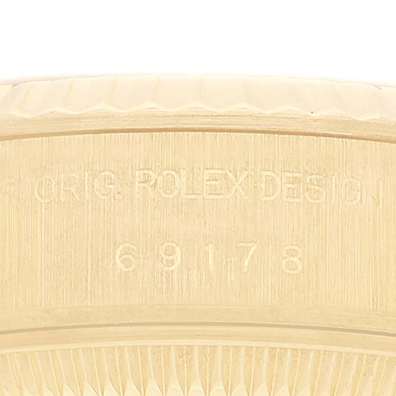 This close-up image shows the engraved reference number on the caseback of a Rolex President 69178 Women's Yellow Gold Champagne Dial 69178 Women's Yellow Gold Champagne Dial watch.