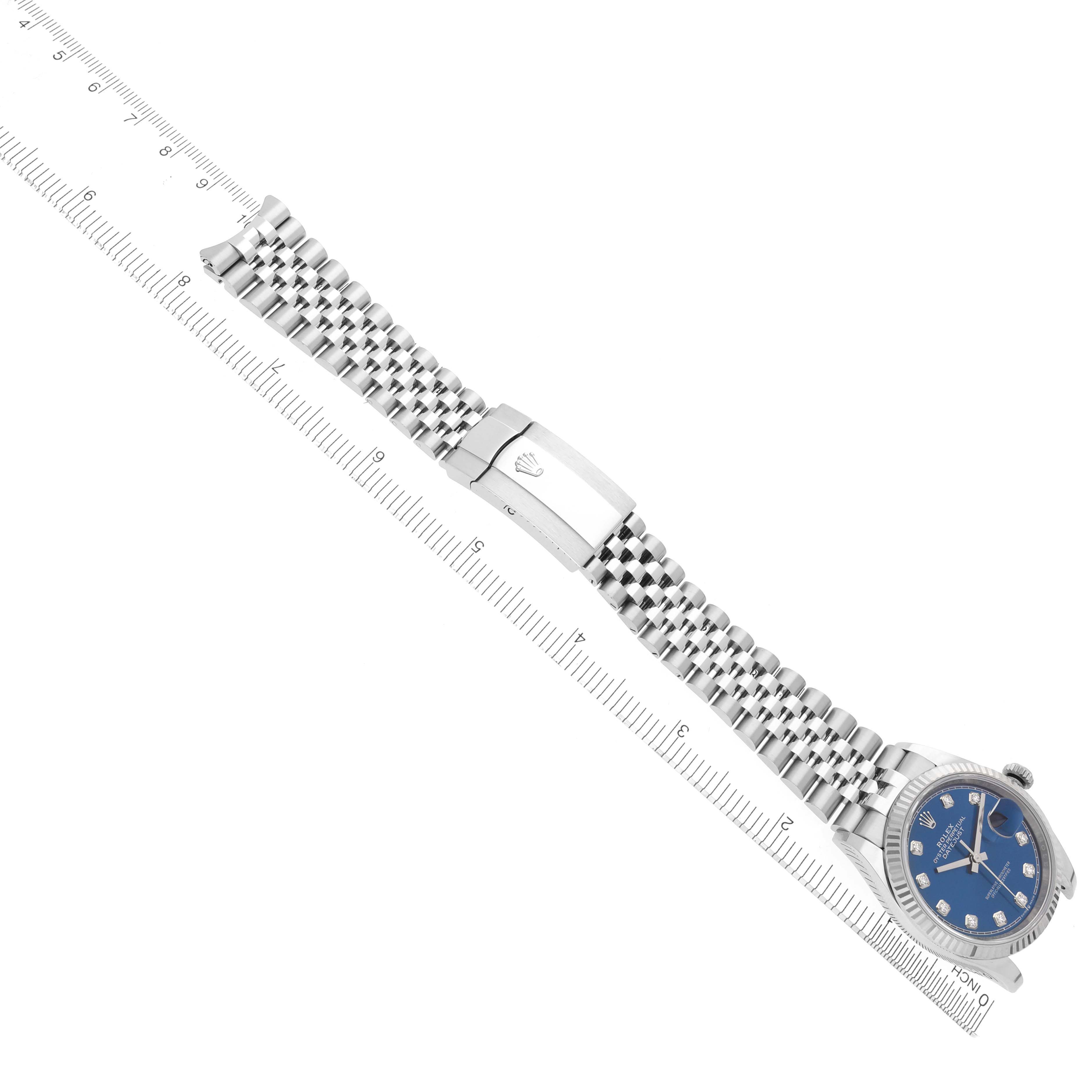 The image shows a Rolex Datejust 126234 Men's Stainless Steel Blue Dial 126234 Men's Stainless Steel Blue Dial watch at an angle highlighting the bracelet, clasp, and blue dial.