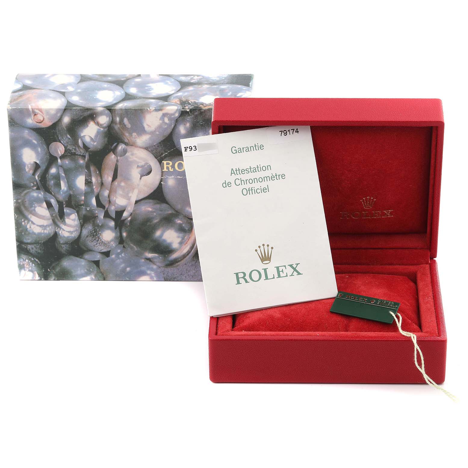 The image shows the packaging and documentation for a Rolex Datejust 79174NRD Women's Stainless Steel Mother of Pearl Dial 79174NRD Women's Stainless Steel Mother of Pearl Dial, including a box and warranty papers, viewed from the front.