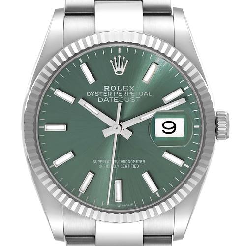 The Rolex Datejust watch is shown from a front angle, displaying the green dial, hands, date window, bezel, and part of the bracelet.