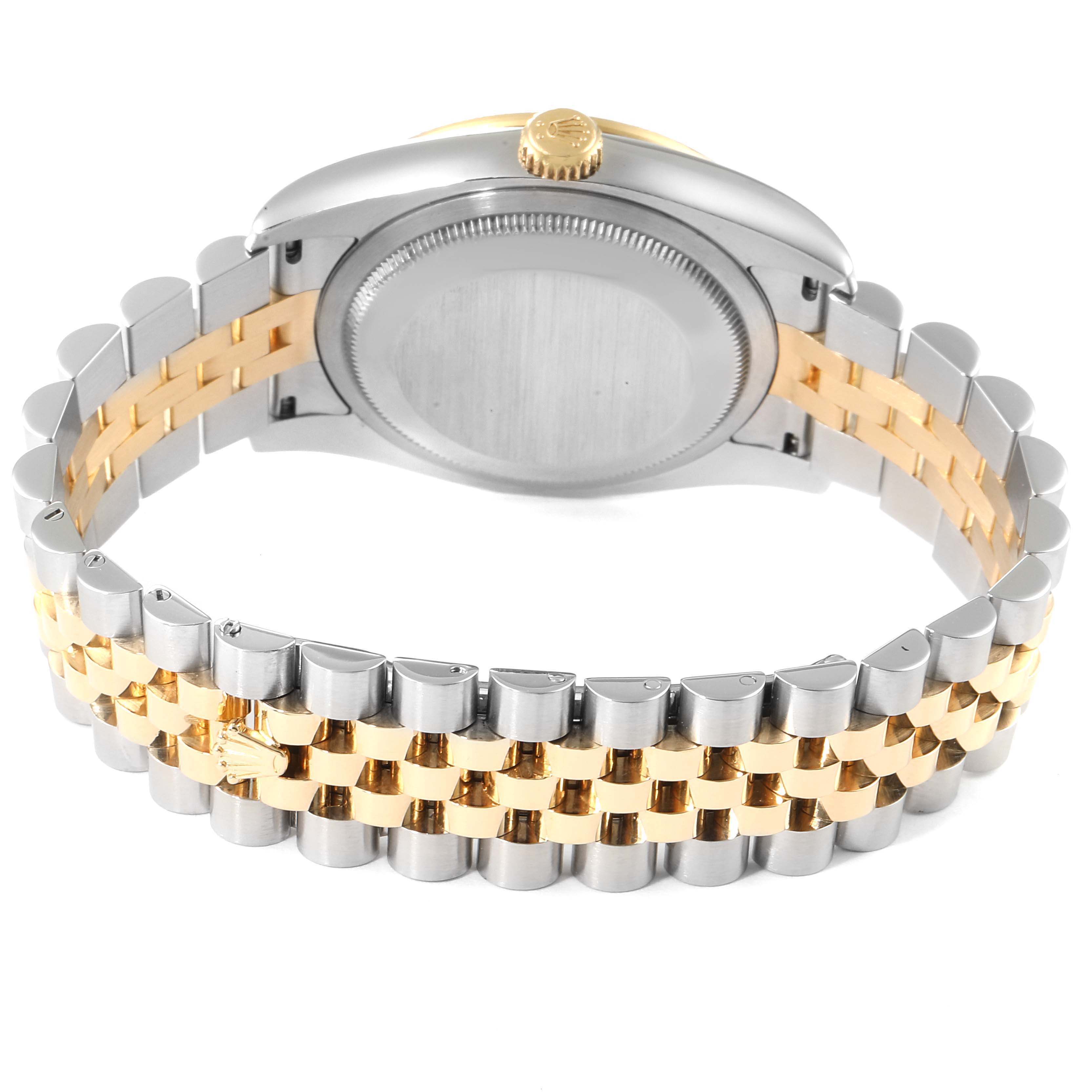 The image shows the back case and bracelet of a Rolex Datejust 116243 Men's Steel and Gold (two tone) Black Dial 116243 Men's Steel and Gold (two tone) Black Dial watch from a rear angle.