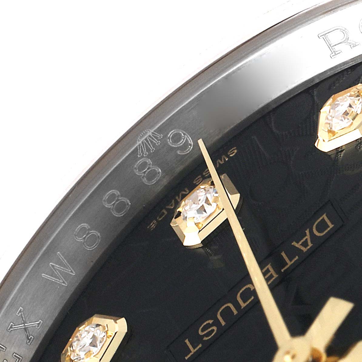 This image shows a close-up of the dial and bezel of a Rolex Datejust 116243 Men's Steel and Gold (two tone) Black Dial 116243 Men's Steel and Gold (two tone) Black Dial watch, focusing on the hour markers and model name.