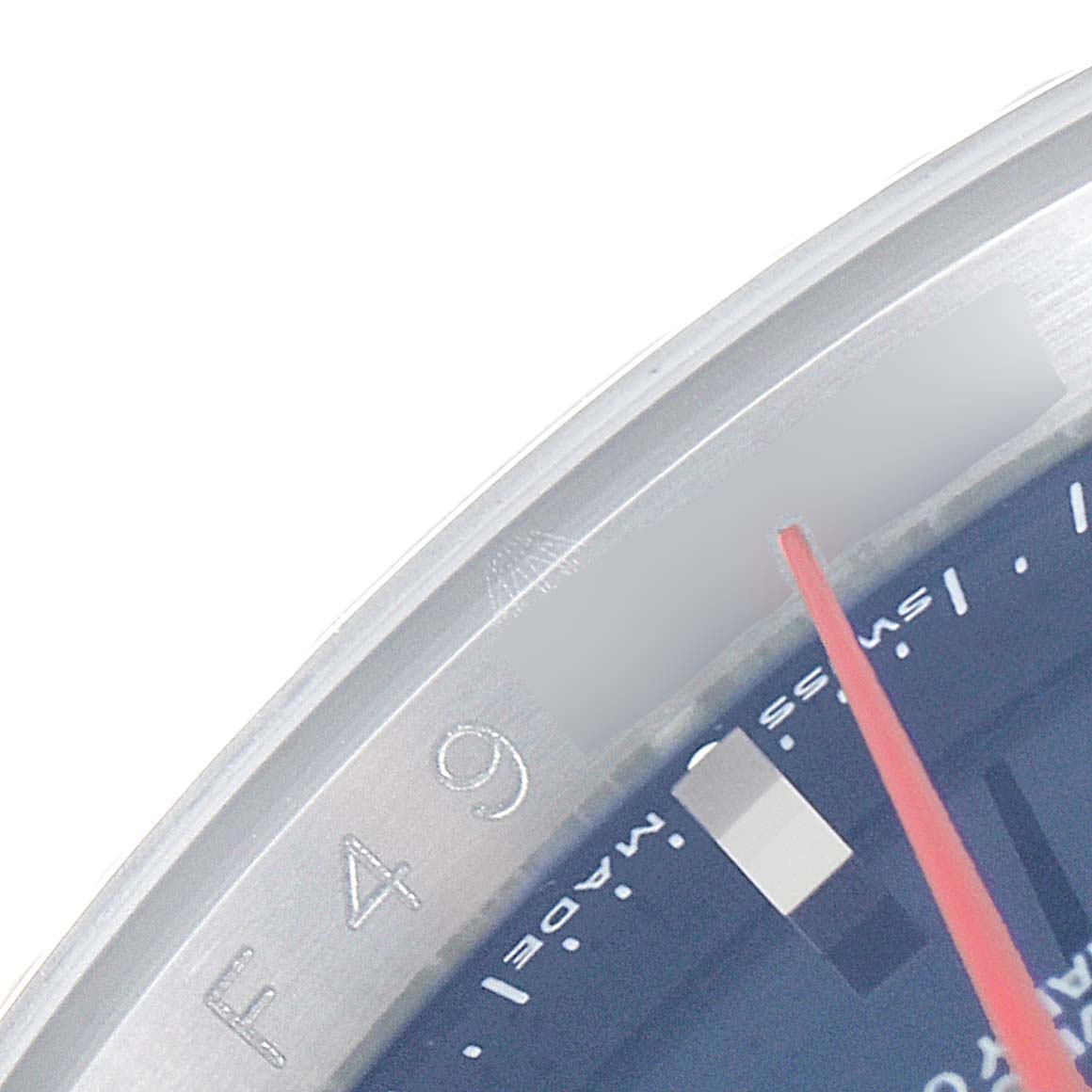 This image shows a close-up of the bezel and dial of a Rolex Turn-o-Graph 116264 Men
s Stainless Steel Blue Dial 116264 Men
s Stainless Steel Blue Dial with partial view of the seconds hand.