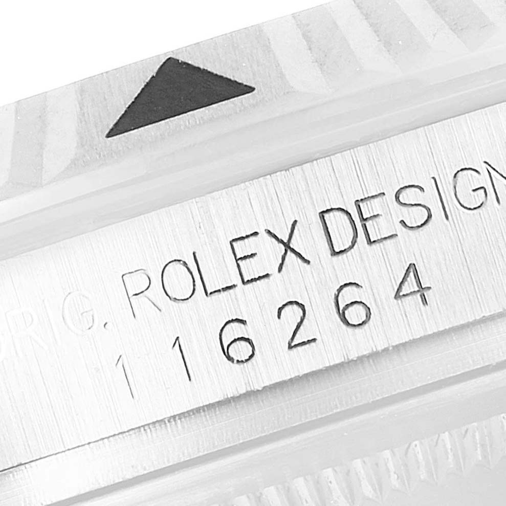 The image shows a close-up of the engraving on the case edge of a Rolex Turn-o-Graph 116264 Men
s Stainless Steel Blue Dial 116264 Men
s Stainless Steel Blue Dial watch, featuring its model number.