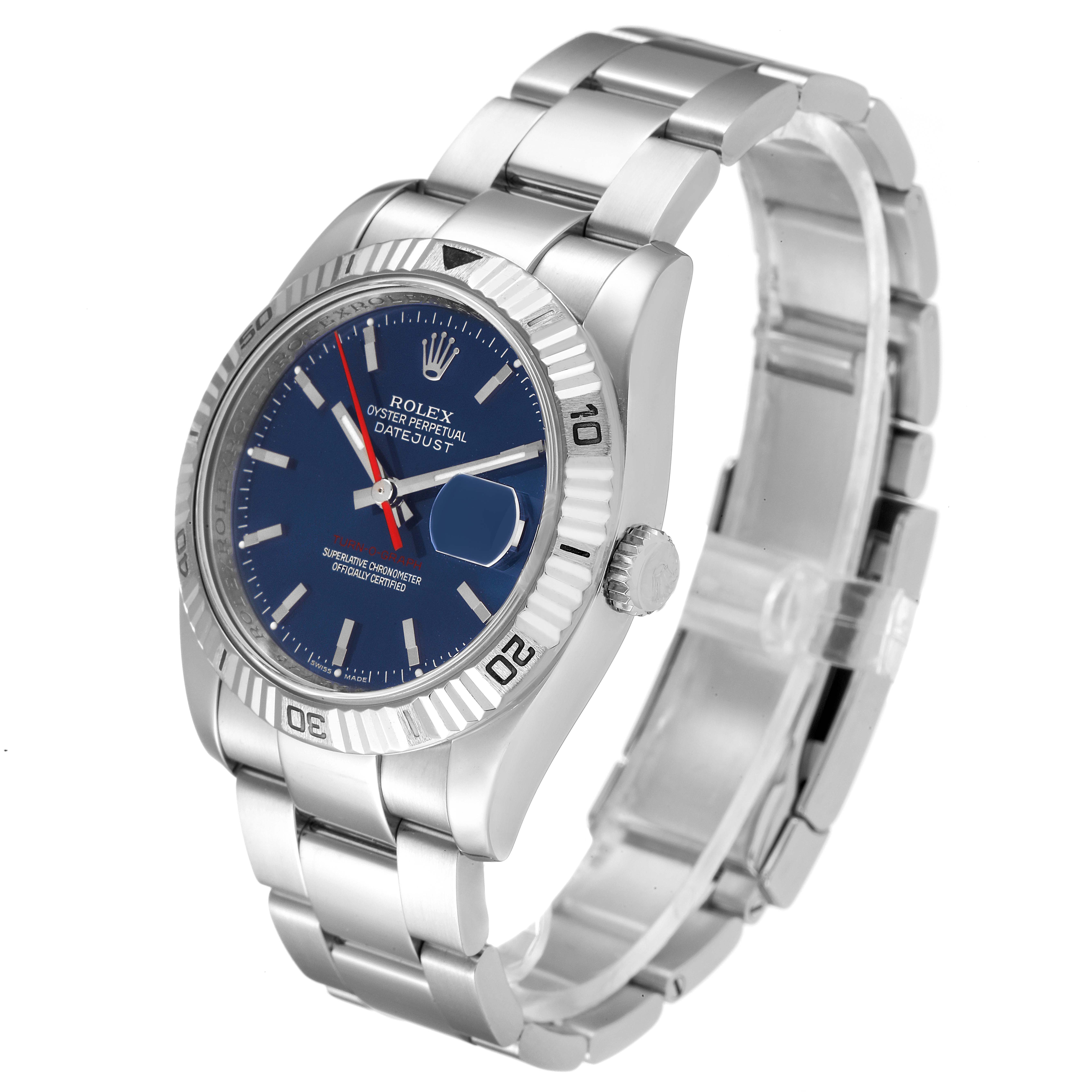 The photo shows a Rolex Turn-o-Graph 116264 Men
s Stainless Steel Blue Dial 116264 Men
s Stainless Steel Blue Dial watch from a three-quarter angle, highlighting the face, bezel, bracelet, and clasp.