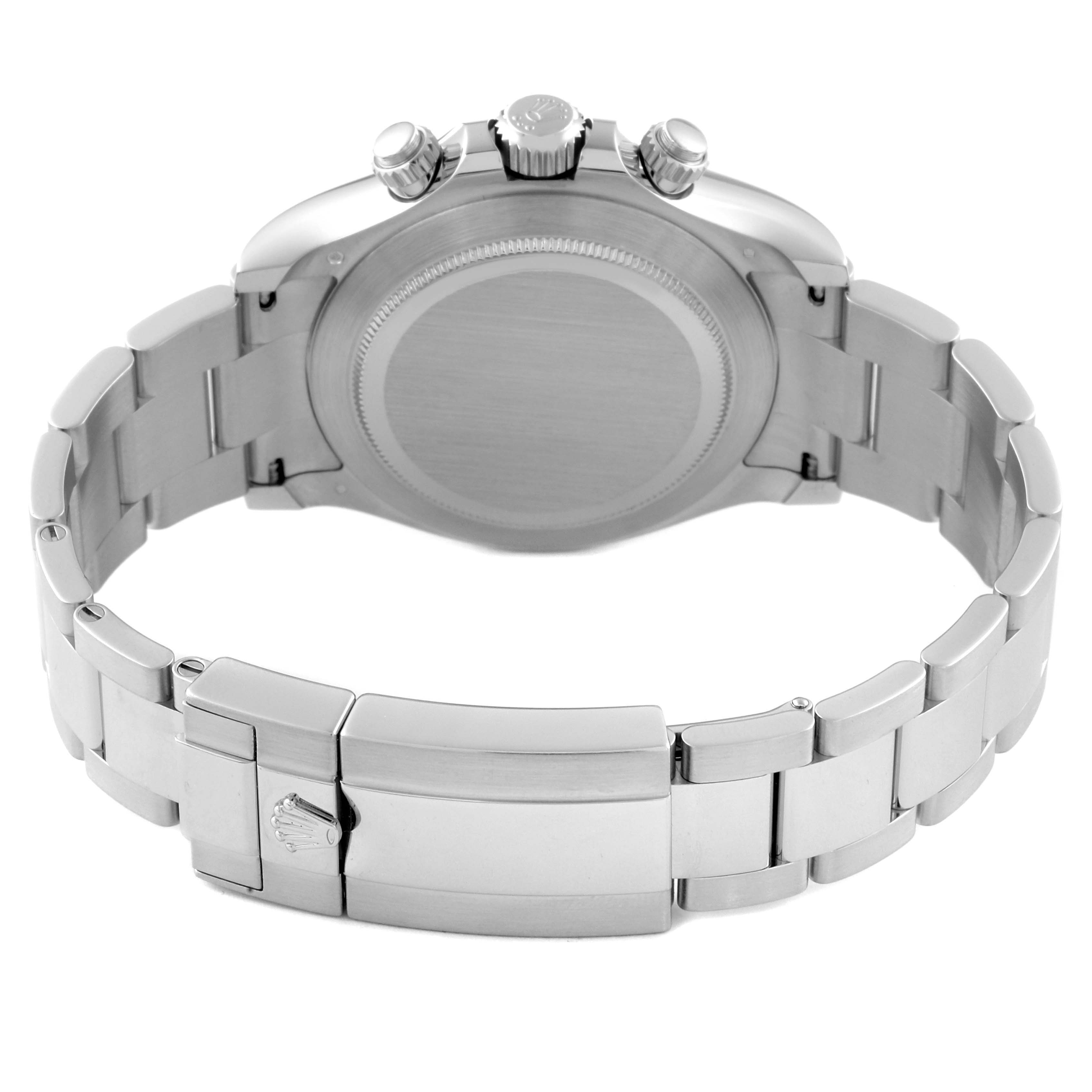 The image shows the back view of a Rolex Daytona 116506 Men's Platinum Blue Dial 116506 Men's Platinum Blue Dial watch, highlighting its clasp, bracelet, and case back.